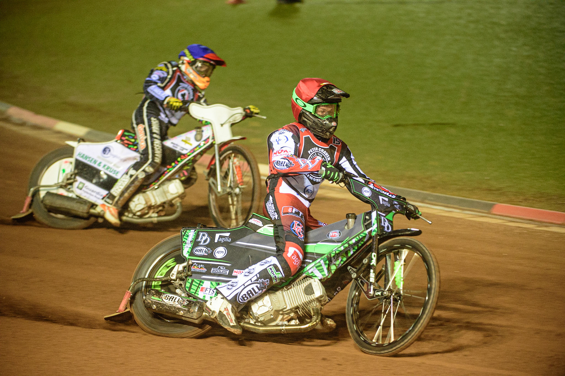 MANCHESTER, UK. MAR 21ST. Charles Wright (Red) outside Niels-Kristian Iversen (Blue) during the ATPI Peter Craven Memorial Trophy at the National Speedway Stadium, Manchester on Monday 21st March 2022. (Credit: Ian Charles | MI News)