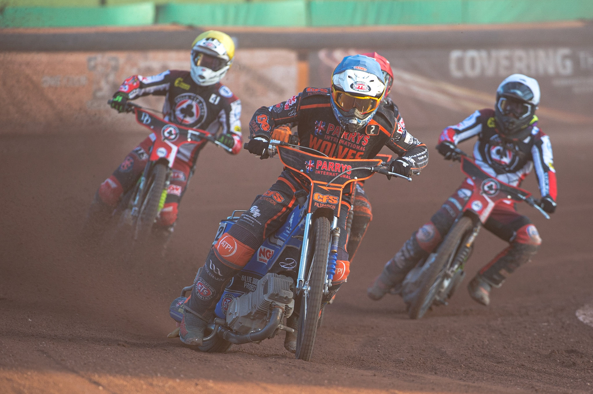 WOLVERHAMPTON, UK. JUN 20TH Steve Worrall  (Blue) leads Sam Masters  (Red), Charles Wright  (Yellow) and Tom Brennan  (White) during the SGB Premiership match between Wolverhampton Wolves and Belle Vue Aces at Monmore Green Stadium, Wolverhampton on Monday 20th June 2022. (Credit: Ian Charles | MI News)