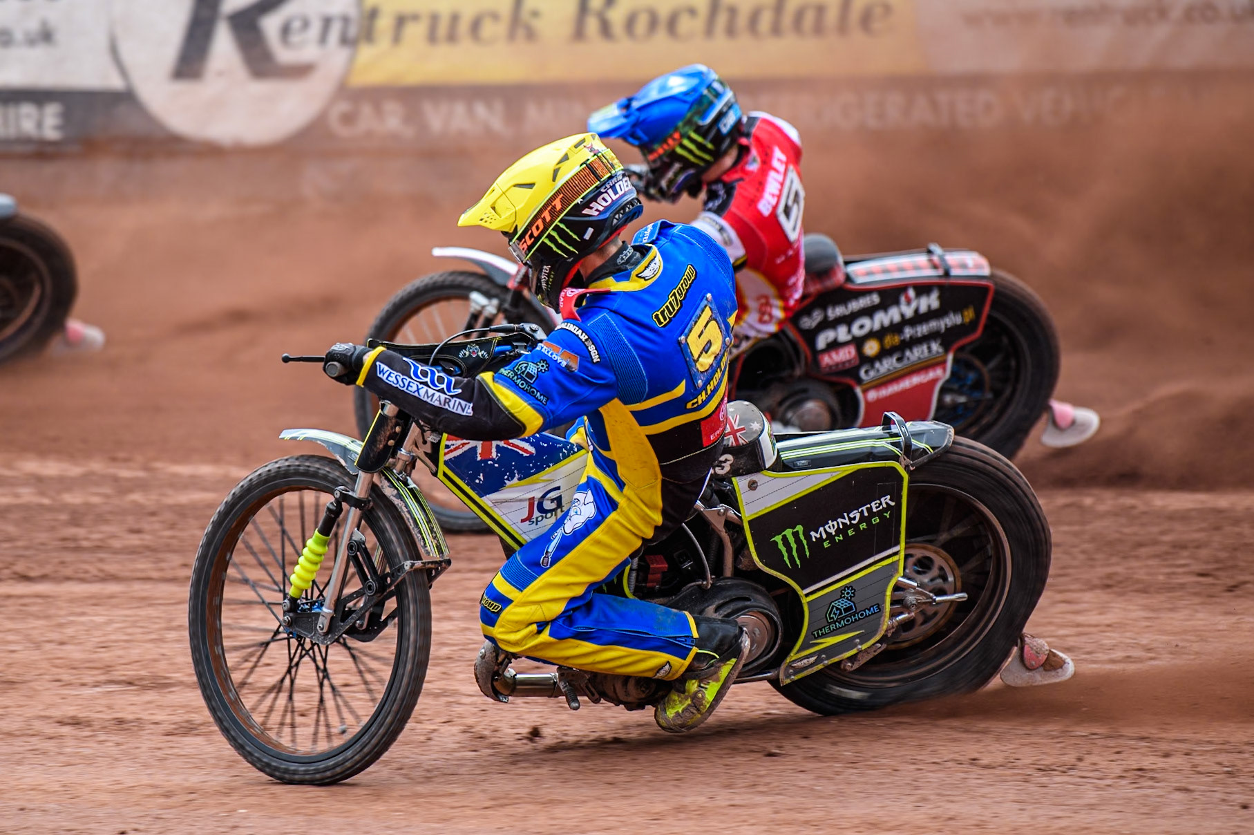 Chris Holder of Sheffield Tigers in Yellow rides inside Dan Bewley of Belle Vue Aces in Blue during the Rowe Motor Oil Premiership match between Belle Vue Aces and Sheffield Tigers at the National Speedway Stadium, Manchester on Monday 5th May 2025. (Photo: Ian Charles | MI News)