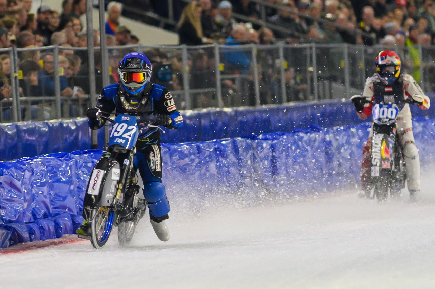 Niclas Svensson (192) of Sweden  in Blue leading Franz Zorn (100) of Austria in Red during the FIM Ice Speedway Gladiators World Championship Final 3 at Ice Rink Thialf, Heerenveen on Saturday 11th April 2026. (Photo: Ian Charles | MI News)