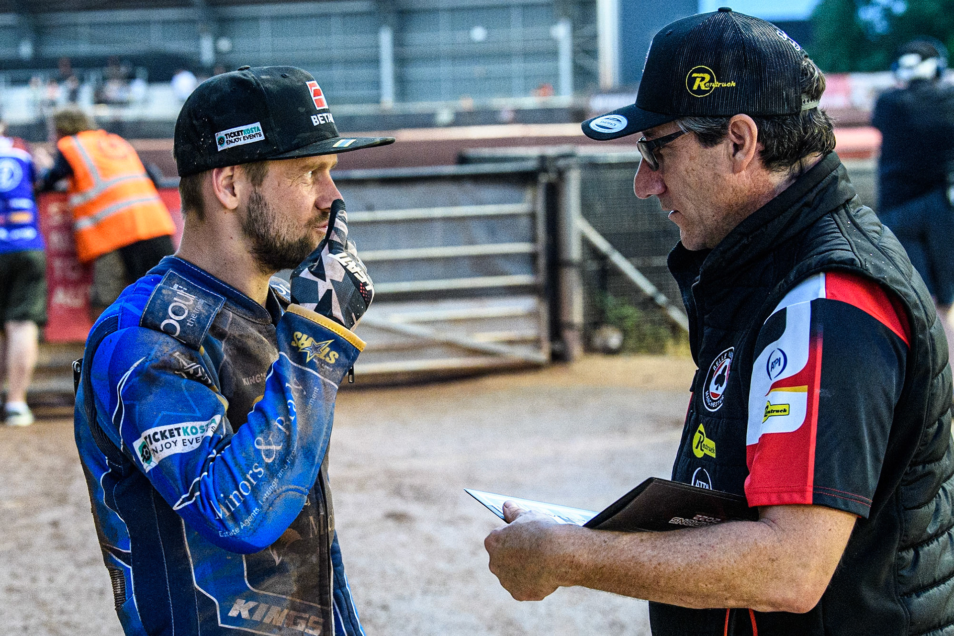 Artem Laguta (left) chats with Belle Vue ATPI Aces Team Manager Mark Lemon during the Sports Insure Premiership match between Belle Vue Aces and King's Lynn Stars at the National Speedway Stadium, Manchester on Monday 12th June 2023. (Photo: Ian Charles | MI News)