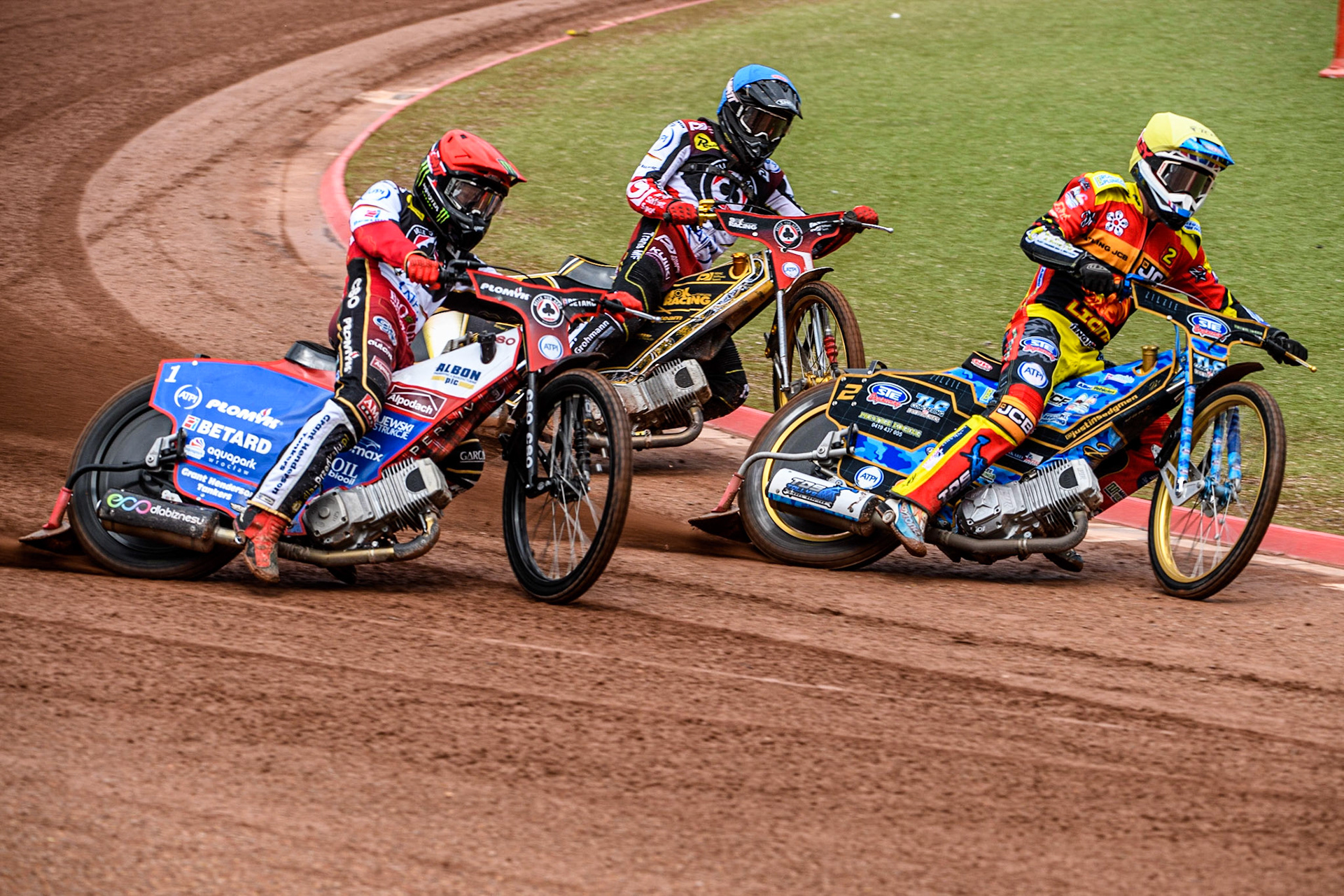 Justin Sedgmen  (Yellow) inside Dan Bewley  (Red) and Norick Blodorn  (Blue) during the SGB Premiership match between Belle Vue Aces and Leicester Lions at the National Speedway Stadium, Manchester on Monday 1st May 2023. (Photo: Ian Charles | MI News)
