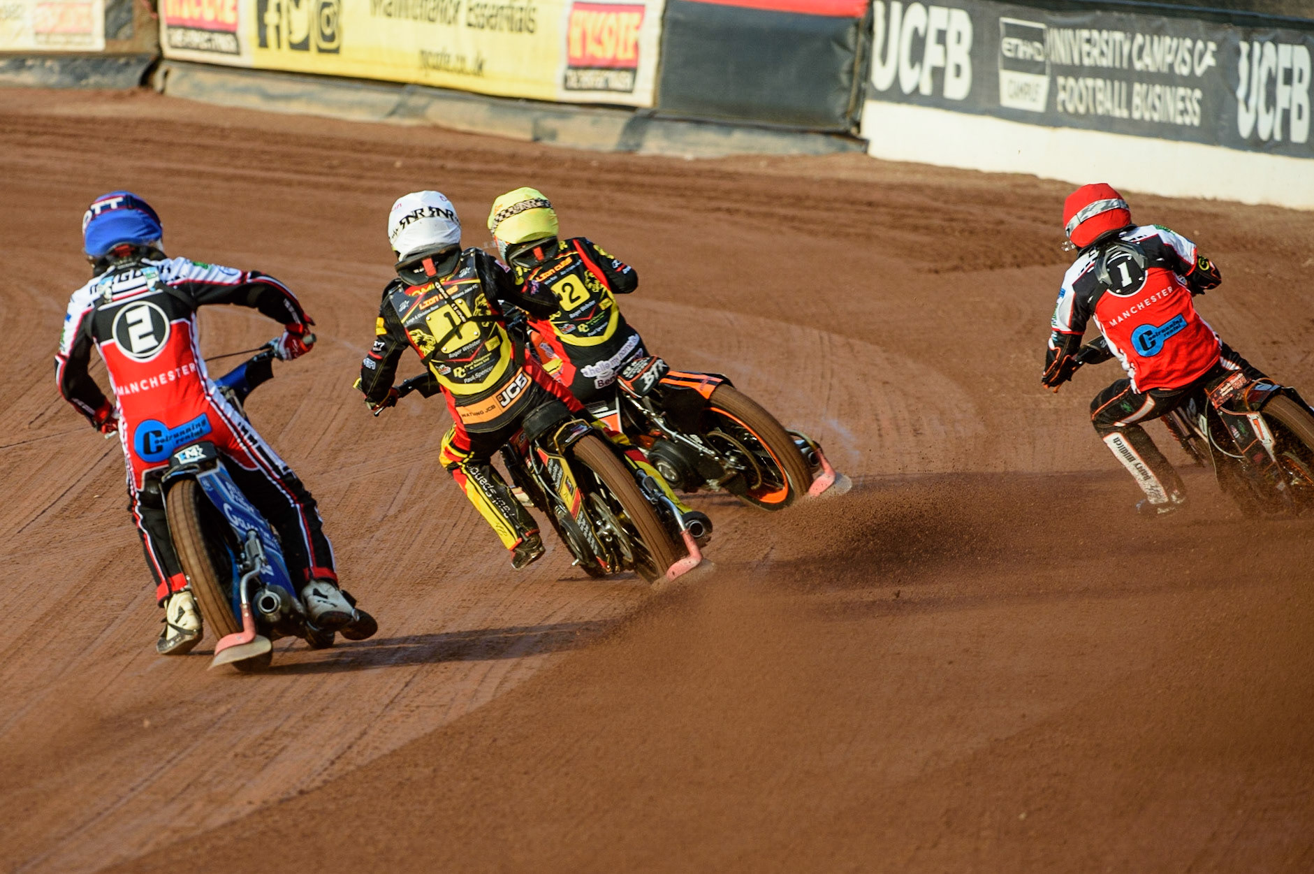MANCHESTER, UK. JULY 29TH  Harry McGurk  (Blue) chases Dan Thompson  (White) Ben Trigger  (Yellow) and Jack Smith  (Red)  during the National Development League match between Belle Vue Colts and Leicester Lion Cubs at the National Speedway Stadium, Manchester on Thursday 29th July 2021. (Credit: Ian Charles | MI News)