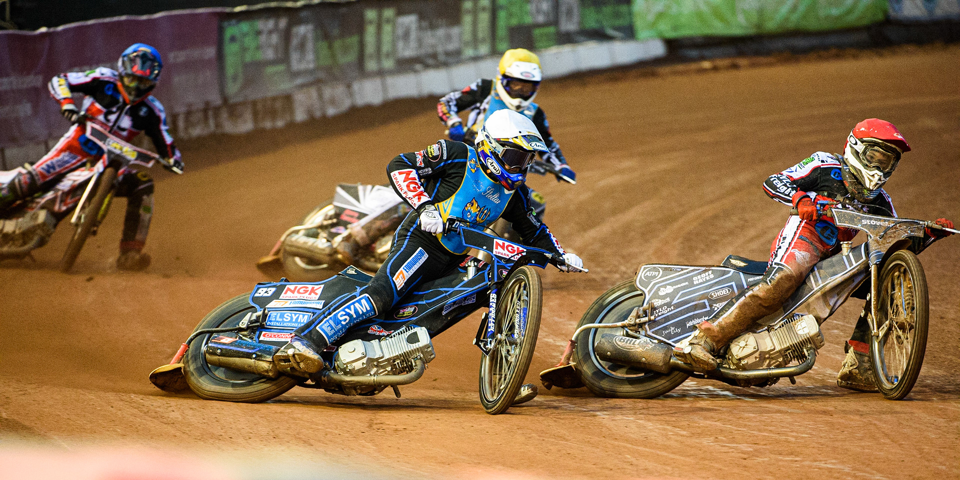 MANCHESTER, UK. AUGUST 20TH  Sam McGurk  (Red) inside Tom Woolley  (White) with Archie Freeman  (Yellow) and Jack Parkinson-Blackburn  (Blue) behindduring the National Development League match between Belle Vue Aces and Armadale Devils at the National Speedway Stadium, Manchester on Friday 20th August 2021. (Credit: Ian Charles | MI News)