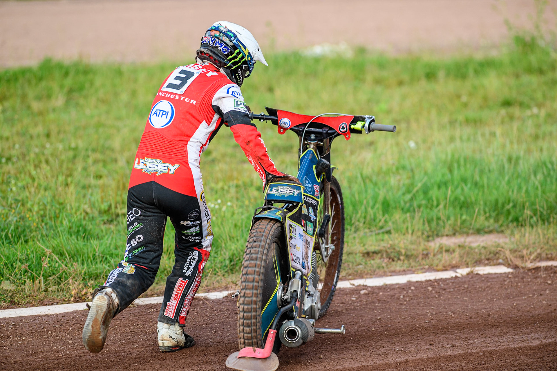 Belle Vue Aces' Jaimon Lidsey pushes his bike off the track after his fall during the Rowe Motor Oil Premiership match between Leicester Lions and Belle Vue Aces at the Pidcock Motorcycles Arena, Leicester on Thursday 25th July 2024. (Photo: Ian Charles | MI News)