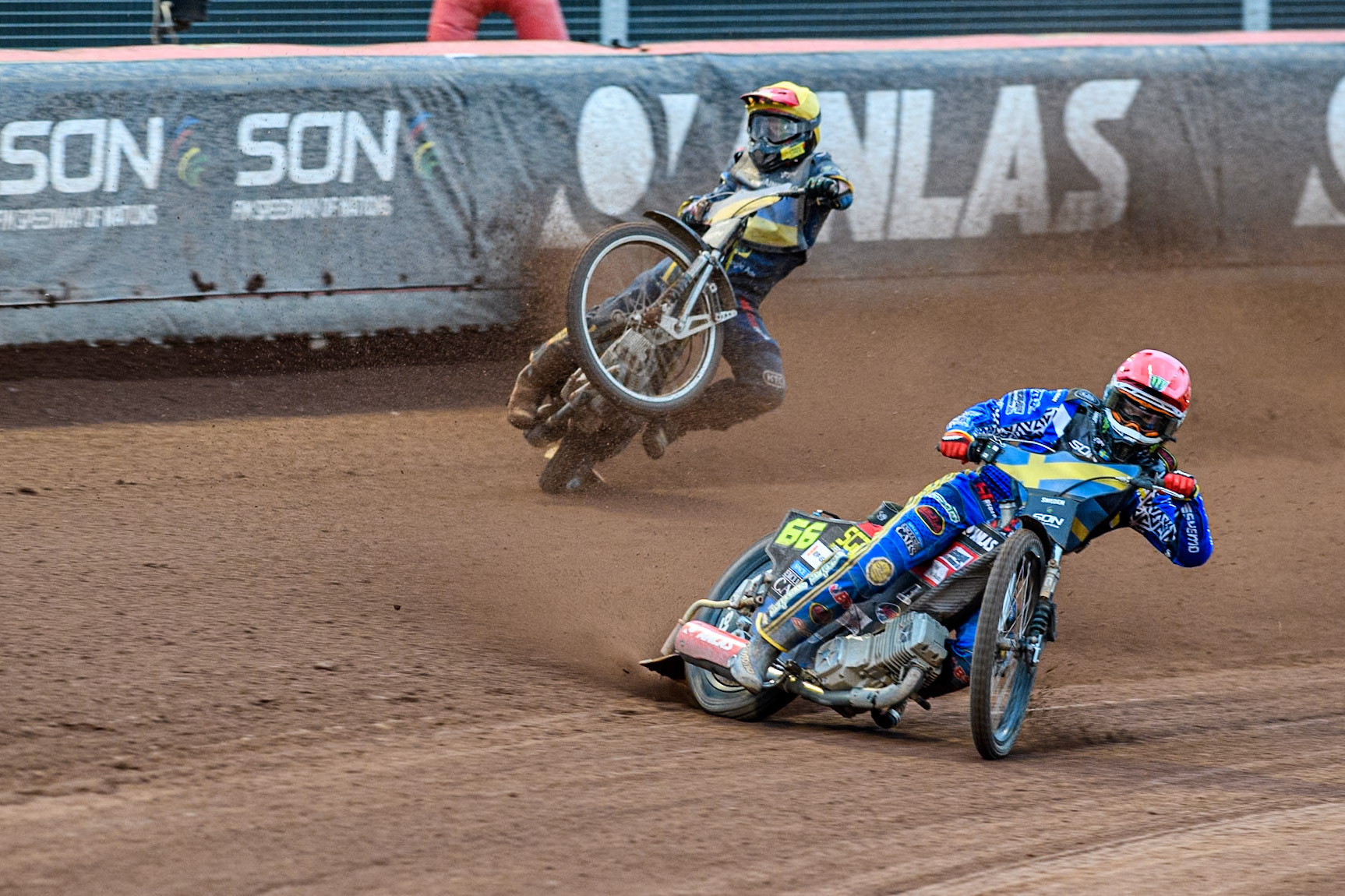 Marko Levishyn of Ukraine in Yellow crashes out of his final heat during the Monster Energy FIM Speedway of Nations Semi-Final 1 at the National Speedway Stadium, Manchester on Tuesday 9th July 2024. (Photo: Ian Charles | MI News)