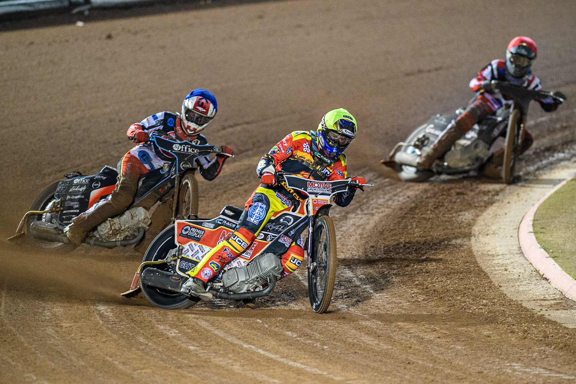 Tom Spencer (Yellow) leads  Freddy Hodder (Blue) and Sam McGurk (Red) during the National Development League match between Belle Vue Colts and Leicester Lion Cubs at the National Speedway Stadium, Manchester on Friday 8th September 2023. (Photo: Ian Charles | MI News)