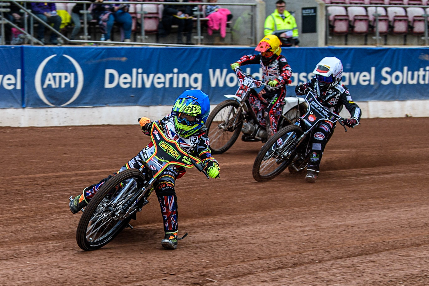 Archie Rolph (Blue) leads Emerson Betty  (White) and Charlie Luckman  (Yellow) during the British Youth Championships at the National Speedway Stadium, Manchester on Friday 12th May 2023. (Photo: Ian Charles | MI News)
