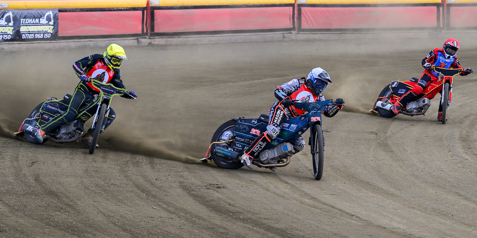 Jack Kingston of NDL Nomads  in White leading Ben Whalley of NDL Nomads    in Yellow and Luke Harris of Buxton Bulls   in Red during the  Challenge match between Buxton Bulls and NDL Nomads at Hi-Edge Speedway, Buxton on Sunday 19th April 2026. (Photo: Ian Charles | MI News)