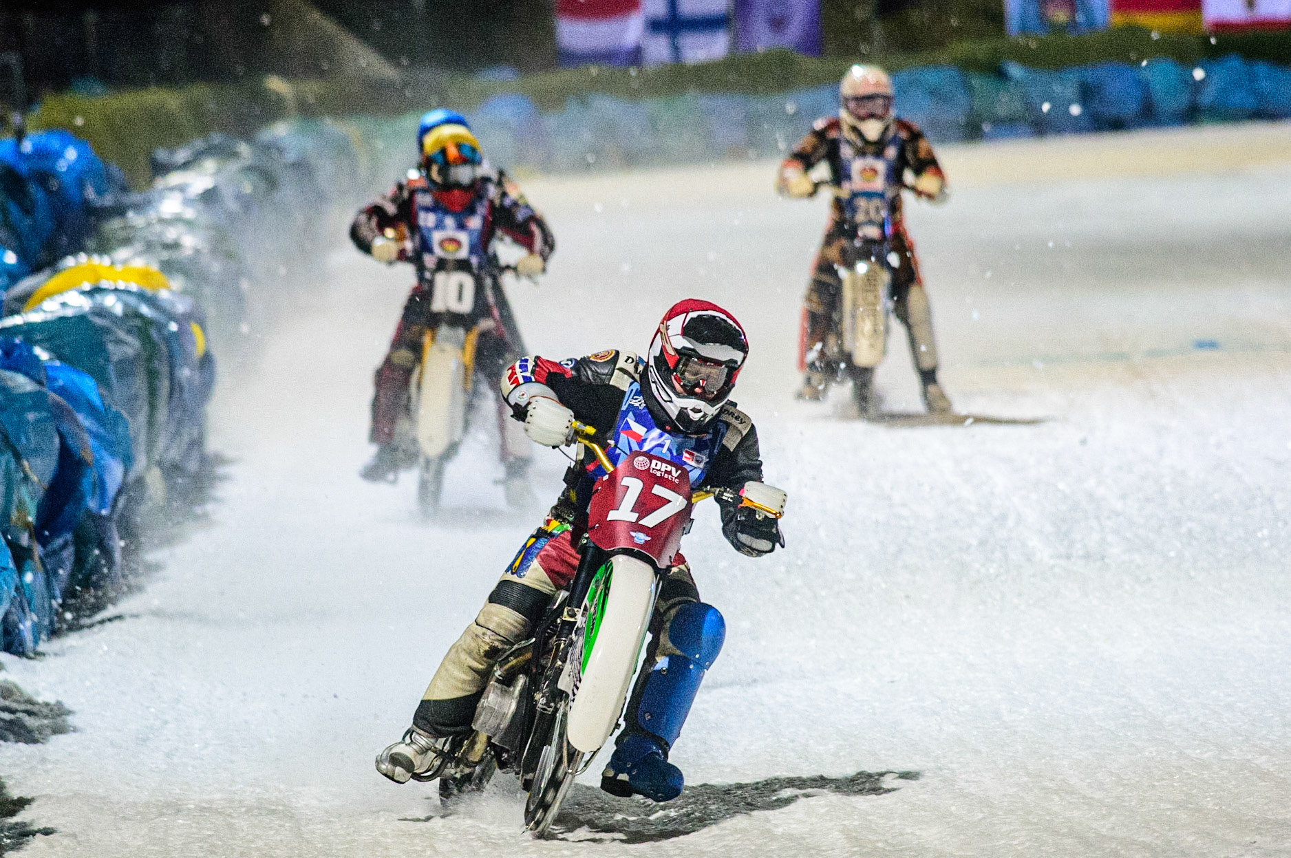 Andrej Divis (Red) leads Topi Mustonen (Yellow) and  Artturi Ervasti (White) during the German Individual Ice Speedway Championship at Horst-Dohm-Eisstadion, Berlin on Friday 3rd March 2023. (Photo: Ian Charles | MI News)