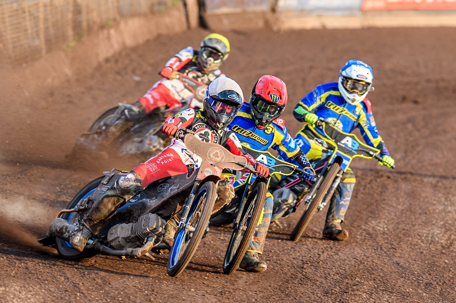 Belle Vue Aces' Brady Kurtz  in White leading Sheffield Tigers' Chris Holder  in Red Sheffield Tigers' Josh Pickering  in Blue and Belle Vue Aces' Norick Blodorn  in Yellow during the Premiership KO Cup Quarter Final, 2nd Leg match between Sheffield Tigers and Belle Vue Aces at Owlerton Stadium, Sheffield on Thursday 9th May 2024. (Photo: Ian Charles | MI News)