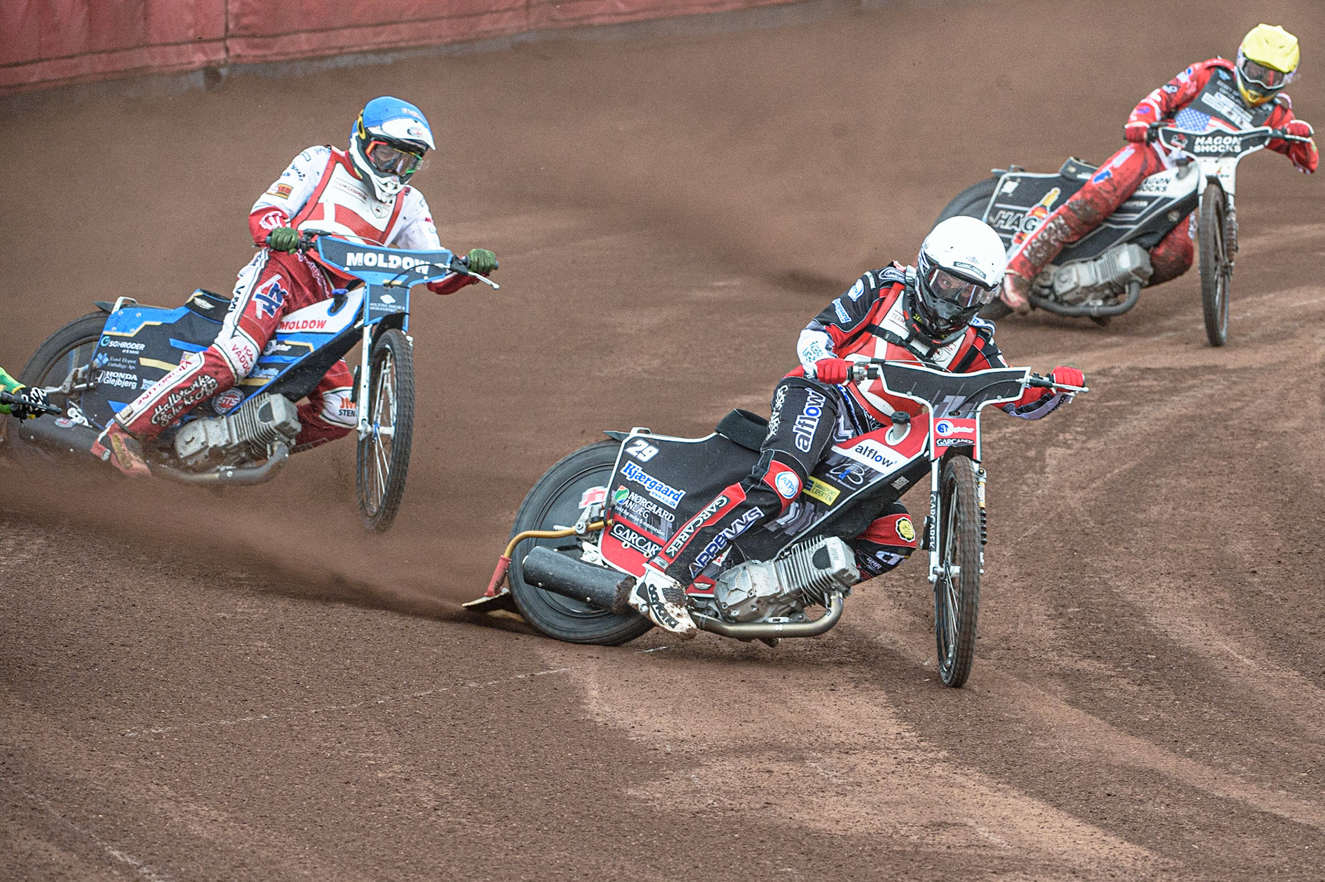 GLASGOW, UK. JUNE 19TH.  Nicolai Klindt (Denmark) (White) leads Rasmus Jensen (Denmark) (Blue) and Broc Nicol (USA) (Yellow) during the FIM Speedway Grand Prix Qualifying Round at the Peugeot Ashfield Stadium, Glasgow on Saturday 19th June 2021. (Credit: Ian Charles | MI News)