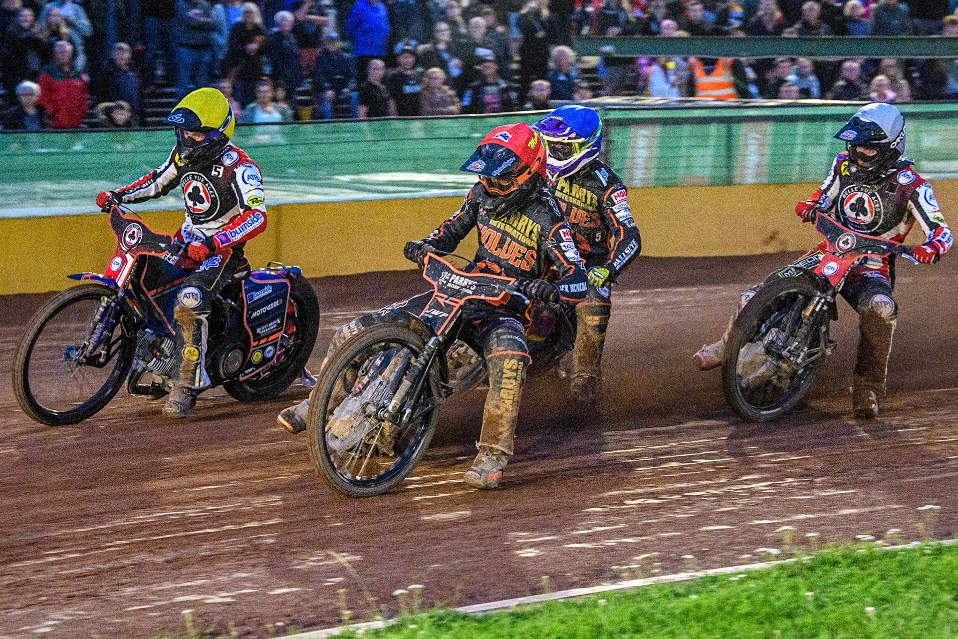 Sam Masters (Red) inside Brady Kurtz (Yellow) with Rory Schlein (Blue) and Tom Brennan (White) behind during the Sports Insure Premiership match between Wolverhampton Wolves and Belle Vue Aces at Monmore Green Stadium, Wolverhampton on Monday 10th July 2023. (Photo: Ian Charles | MI News)
