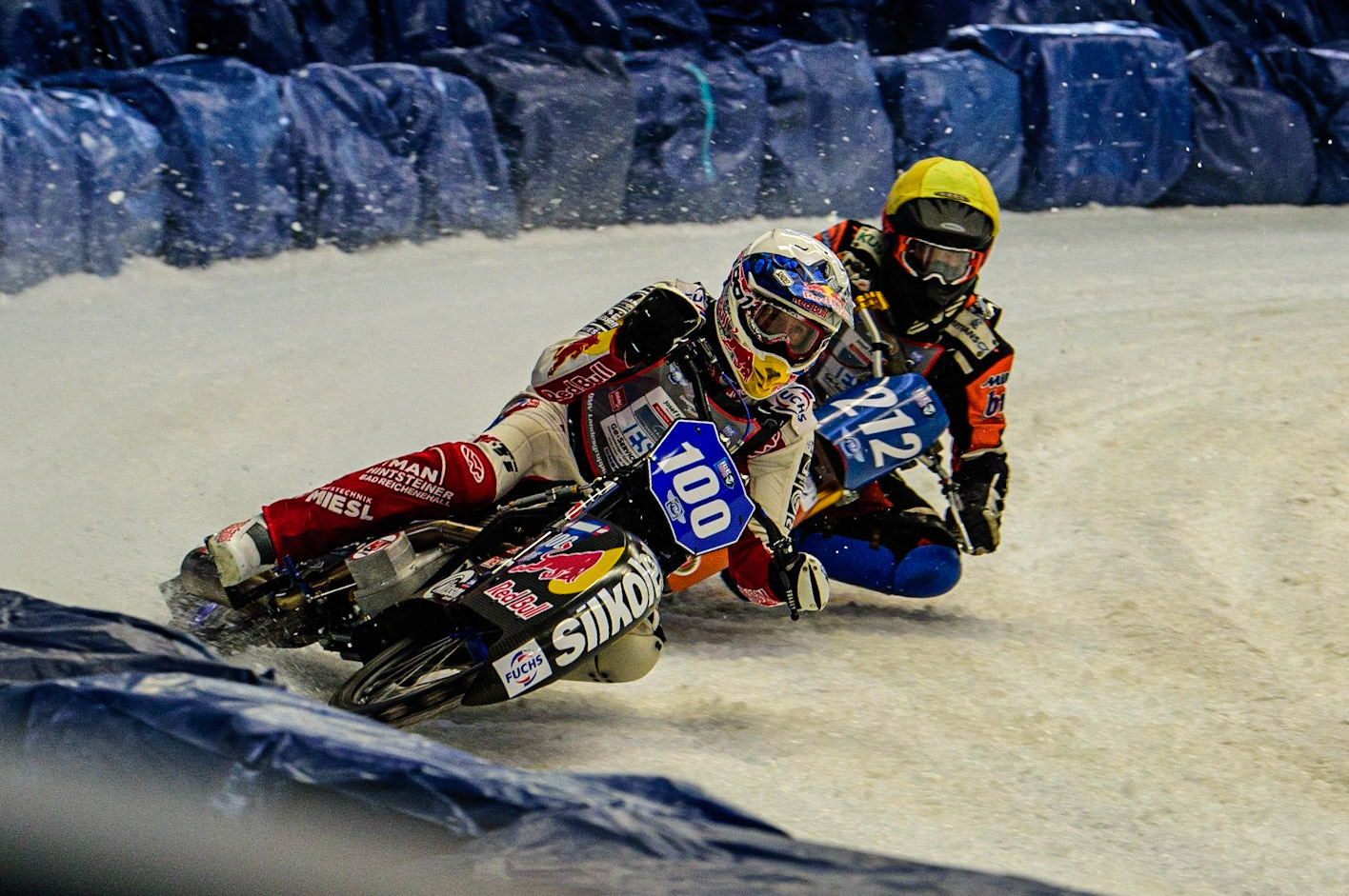 Franz Zorn (100) (White) battles with Lukas Hutla (212) (Yellow) during the Ice Speedway Gladiators World Championship Final 2 at Max-Aicher-Arena, Inzell, Germany on Sunday 19th March 2023. (Photo: Ian Charles | MI News)