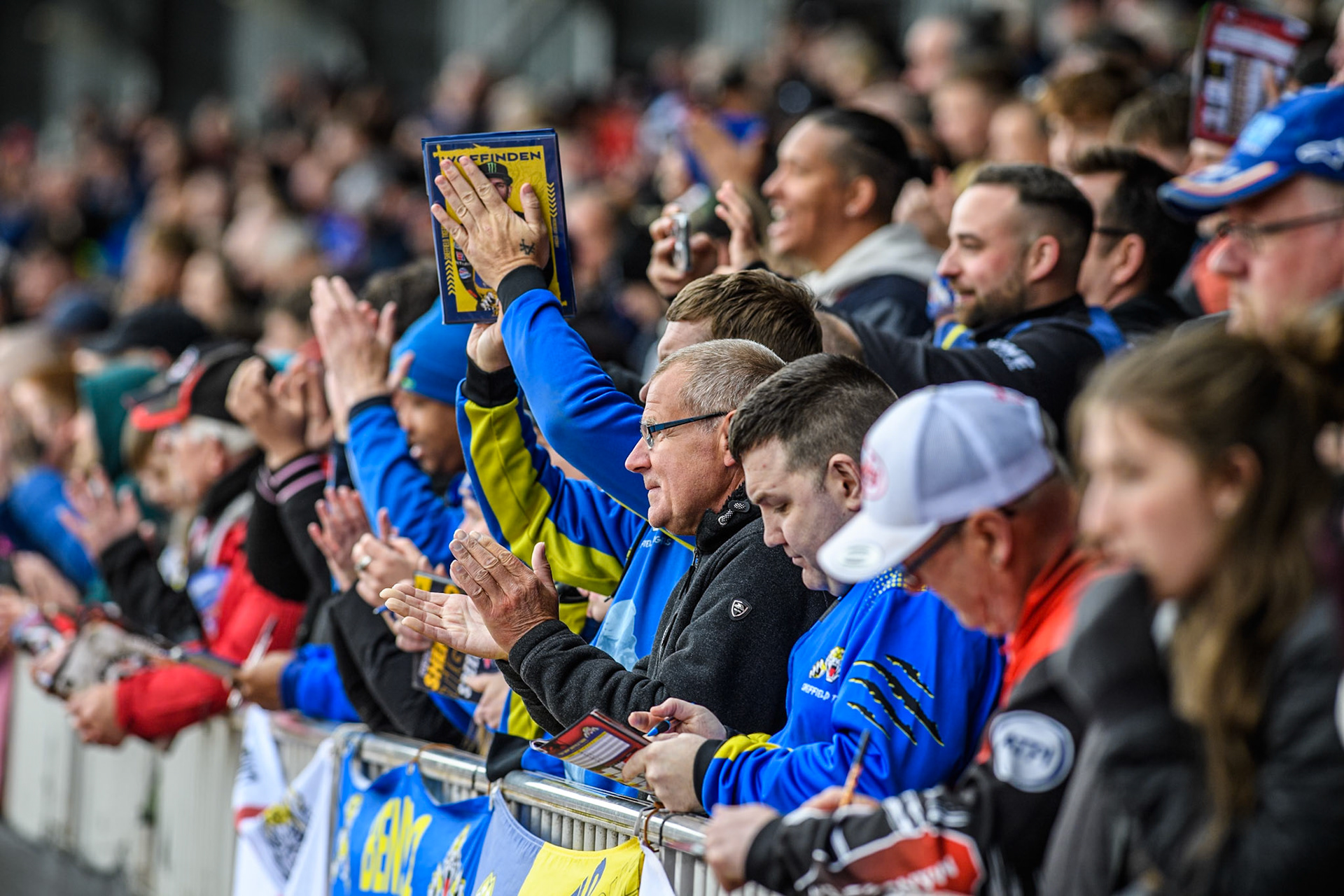 Sheffield fans applaud their riders after a heat win during the Rowe Motor Oil Premiership match between Belle Vue Aces and Sheffield Tigers at the National Speedway Stadium, Manchester on Monday 5th May 2025. (Photo: Ian Charles | MI News)