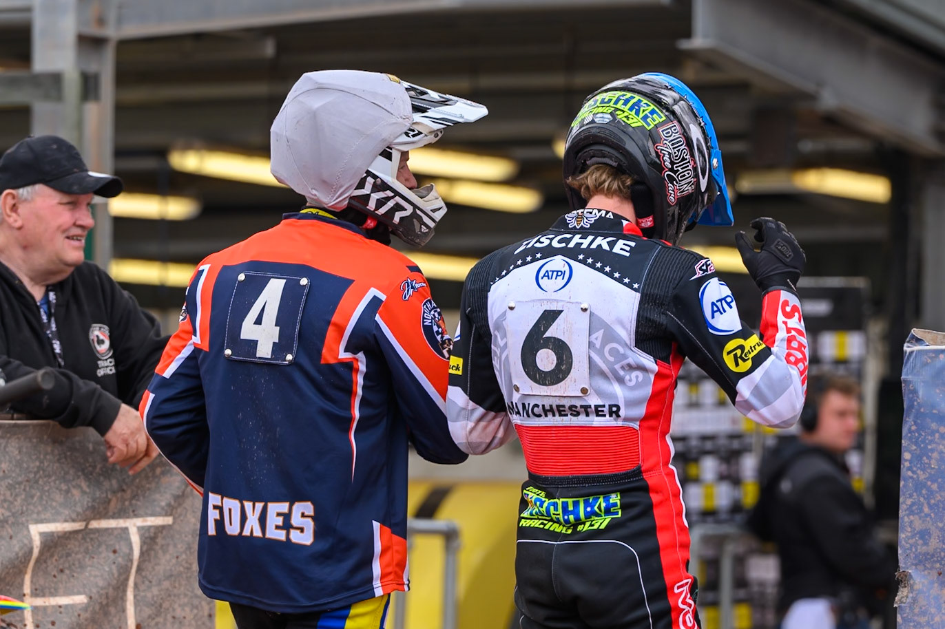 Jye Etheridge, Guest Rider for Northampton Foxes in White and Tate Zischke of Belle Vue Aces in Blue walk off after their heat during the Rowe Motor Oil Premiership match between Belle Vue Aces and Northampton Foxes at the National Speedway Stadium, Manchester on Monday 4th May 2026. (Photo: Ian Charles | MI News)