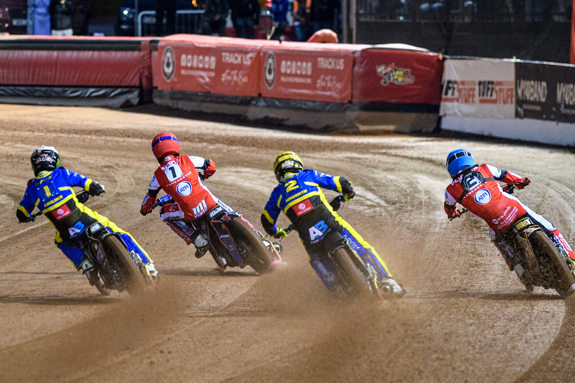 (L to R) Sheffield Tigers' Jack Holder  in White, Belle Vue Aces' Brady Kurtz  in Red Sheffield Tigers' Kyle Howarth  in Yellow and Belle Vue Aces' Norick Blodorn  in Blue during the Rowe Motor Oil Premiership Play Off Semi Final 2, 1st Leg match between Belle Vue Aces and Sheffield Tigers at the National Speedway Stadium, Manchester on Monday 16th September 2024. (Photo: Ian Charles | MI News)