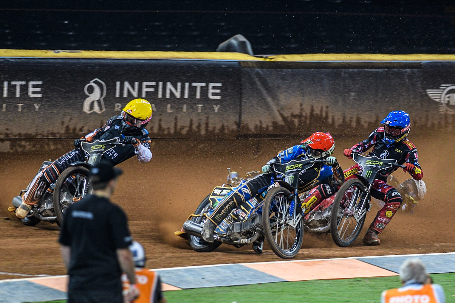 Jack Holder (25) (Red) inside Kim Nilsson (233) (Yellow) with Max Fricke (46) (Blue) behind as Jason Doyle (69) falls at the back during the FIM Speedway Grand Prix of Great Britain at the Principality Stadium, Cardiff on Saturday 2nd September 2023. (Photo: Ian Charles | MI News)