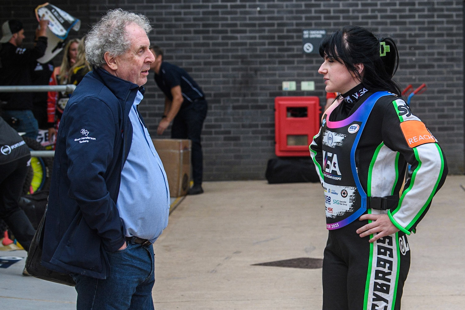 Lucy Brooke (right) chats with ACU Chair Tony Steele during the FIM Women's  Speedway Academy at the National Speedway Stadium, Manchester on Friday 4th August 2023. (Photo: Ian Charles | MI News)