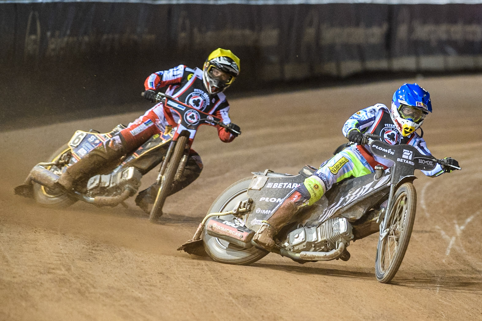Poland’s Maceij Janowski (Blue) leads  England's Connor Mountain (Yellow) during the Peter Craven Memorial Trophy meeting at the National Speedway Stadium, Manchester on Monday 18th March 2024. (Photo: Ian Charles | MI News)