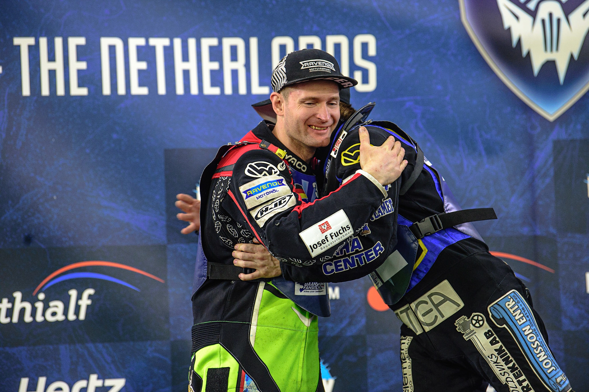 HEERENVEEN, NL.  Martin Hååruhiltunen (199)  consoles Johann Weber (33)  during the FIM Ice Speedway Gladiators World Championship Final 4 at Ice Rink Thialf, Heerenveen on Sunday  3 April 2022. (Credit: Ian Charles | MI News)