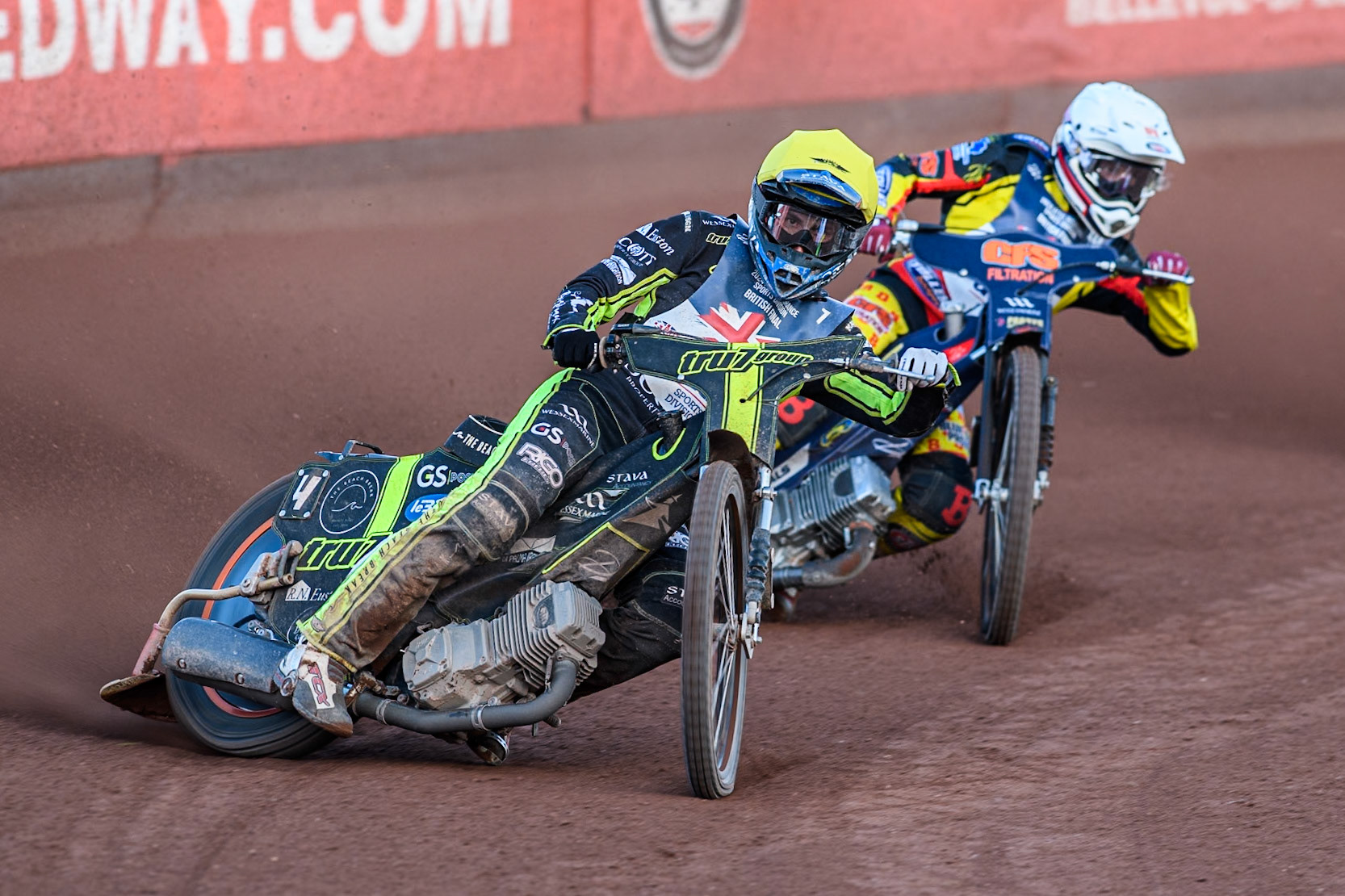 Adam Ellis in Yellow leading Tom Brennan in White during the Attis Insurance Sports Division British Speedway Championship Final at the National Speedway Stadium, Manchester on Saturday 8th June 2024. (Photo: Ian Charles | MI News)
