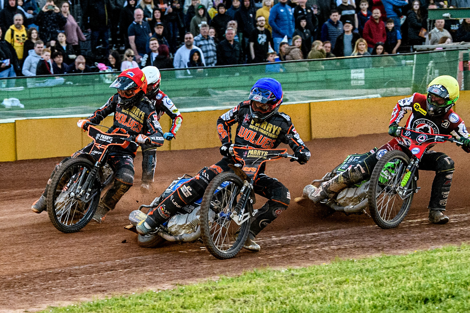 Steve Worrall (Blue) and Sam Masters (Red) lead Jaimon Lidsey (White) and Charles Wright (Yellow) during the Sports Insure Premiership match between Wolverhampton Wolves and Belle Vue Aces at Monmore Green Stadium, Wolverhampton on Monday 29th May 2023. (Photo: Ian Charles | MI News)