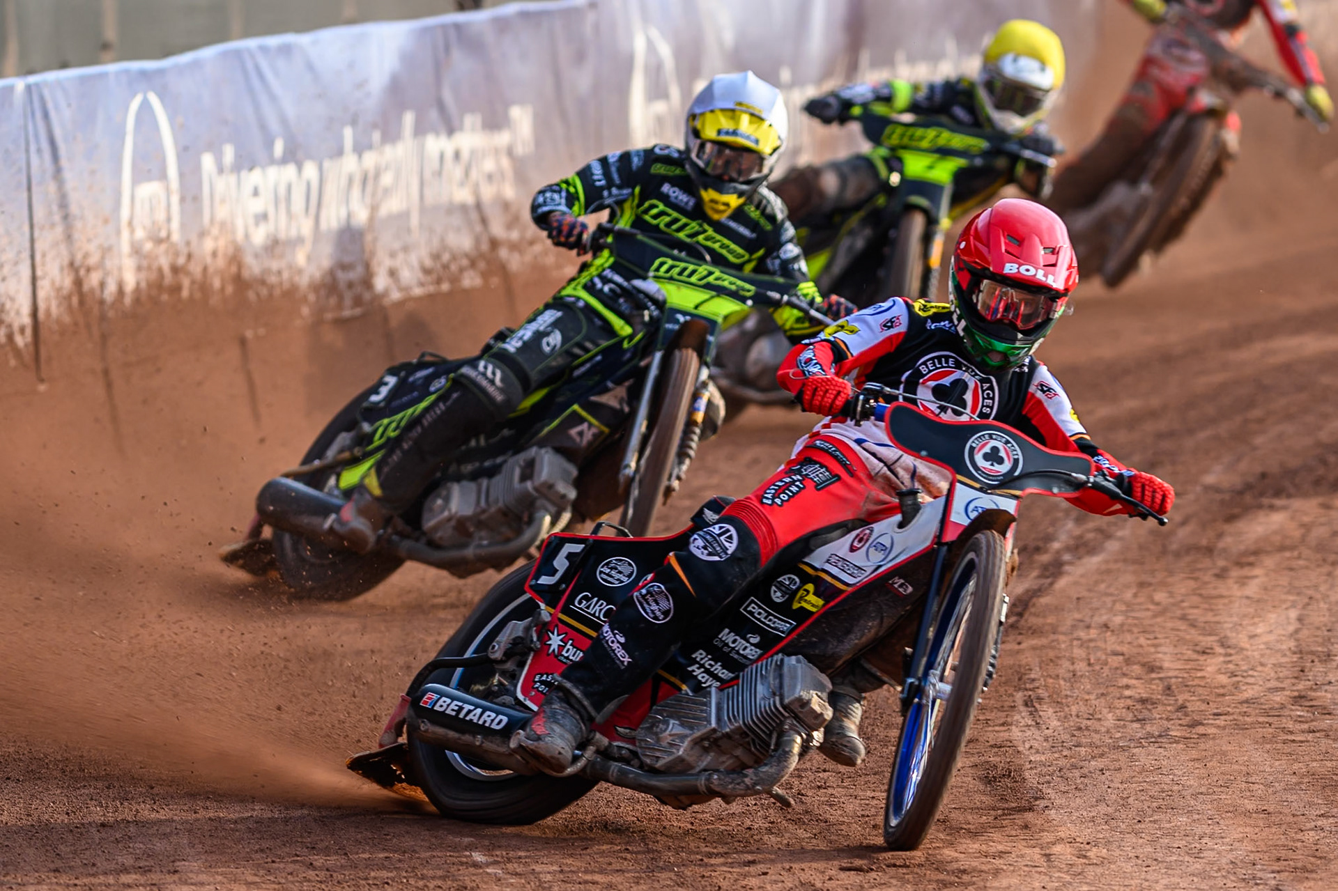 Belle Vue Aces' Brady Kurtz  in Red leading Ipswich Witches' Adam Ellis  in White Ipswich Witches' Tom Brennan  in Yellow and Belle Vue Aces' Tate Zischke in Blue during the Rowe Motor Oil Premiership match between Belle Vue Aces and Ipswich Witches at the National Speedway Stadium, Manchester on Monday 30th June 2025. (Photo: Ian Charles | MI News)