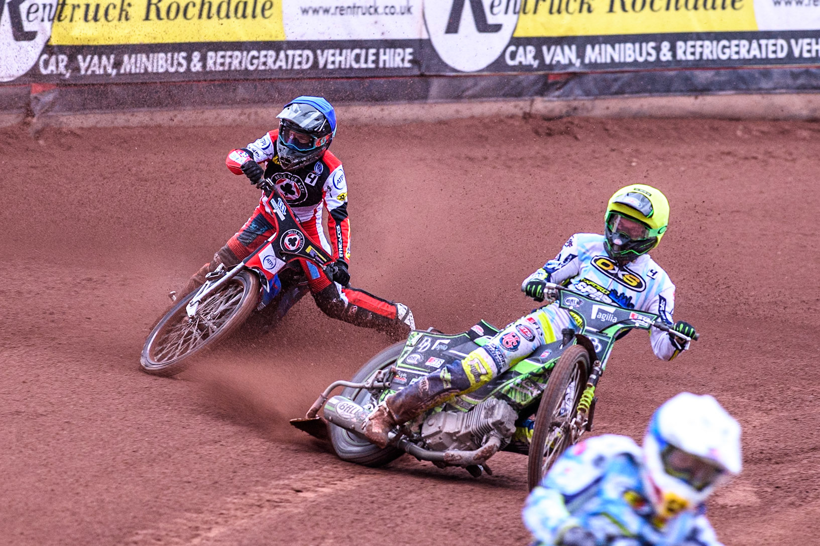 Belle Vue Aces' Ben Cook in Blue loses control after a tangle with Oxford Spires' Charles Wright in Yellow during the Rowe Motor Oil Premiership match between Belle Vue Aces and Oxford Spires at the National Speedway Stadium, Manchester on Monday 22nd July 2024. (Photo: Ian Charles | MI News)