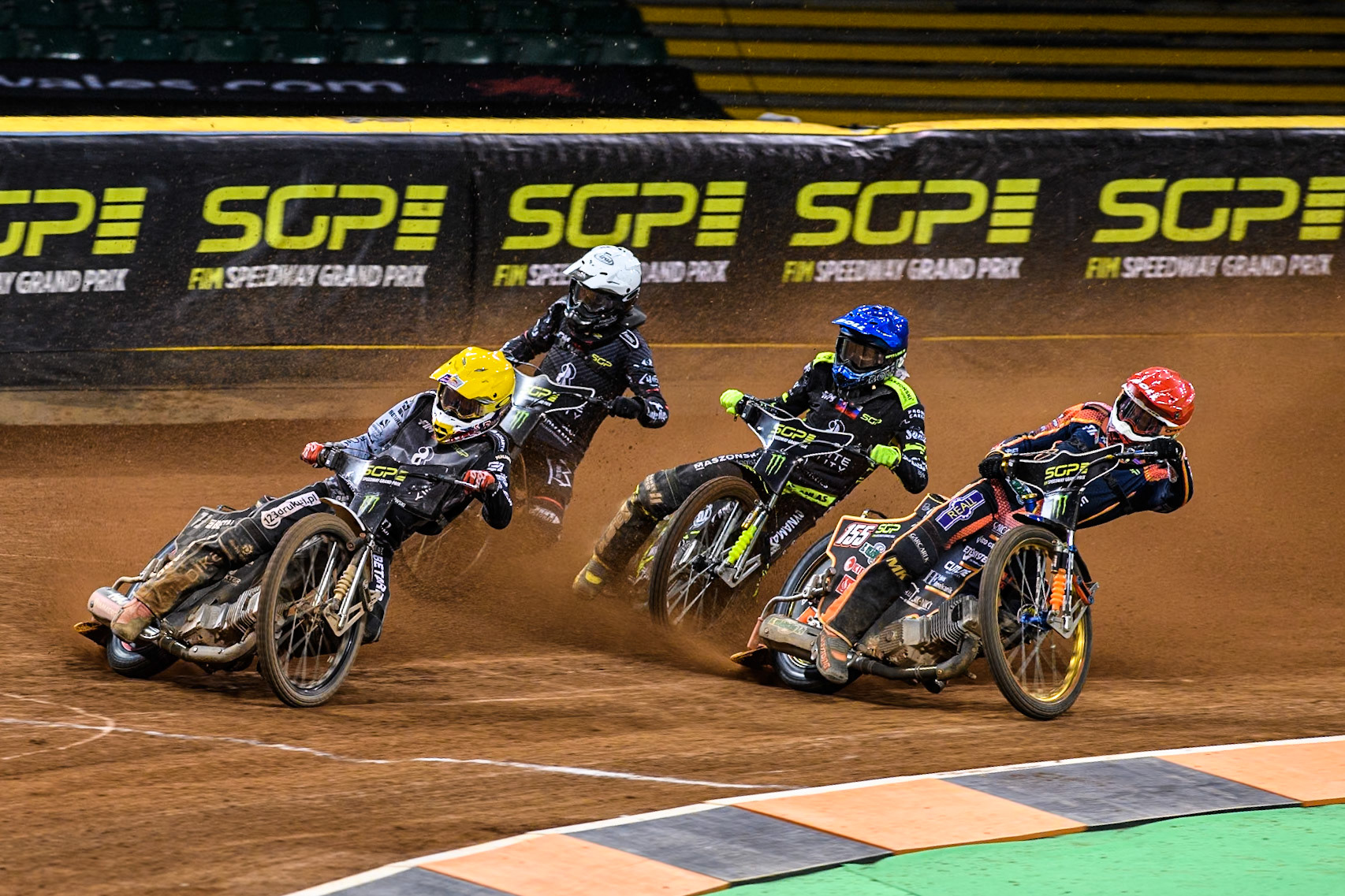Maciej Janowski (71) of Poland in Yellow leading Mikkel Michelsen (155) of Denmark in Red Martin Vaculik (54) of Slovakia in Blue and Kai Huckenbeck (744) of Germany in White during the FIM Speedway Grand Prix of Great Britain at The Principality Stadium, Cardiff on Saturday 17th August 2024. (Photo: Ian Charles | MI News)