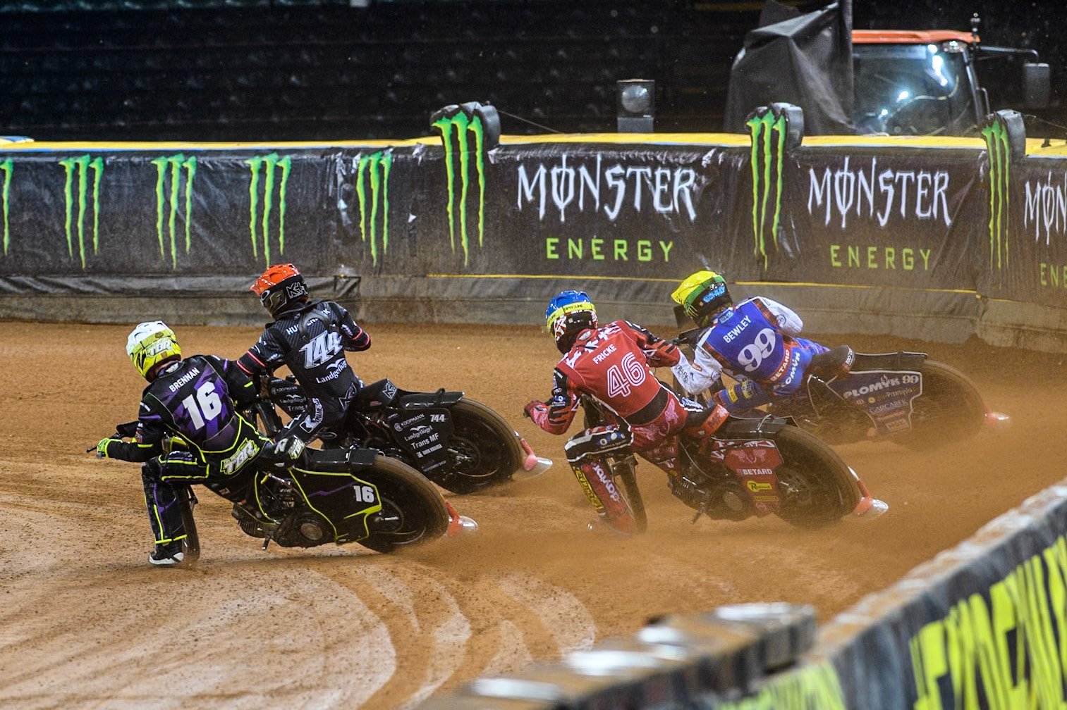 Tom Brennan (16) Wild card rider of Great Britain in White rides inside Kai Huckenbeck (744) of Germany in Red, Max Fricke (46) of Australia in Blue and Daniel Bewley (99) of Great Britain in Yellow during the FIM Speedway Grand Prix of Great Britain at The Principality Stadium, Cardiff on Saturday 17th August 2024. (Photo: Ian Charles | MI News)