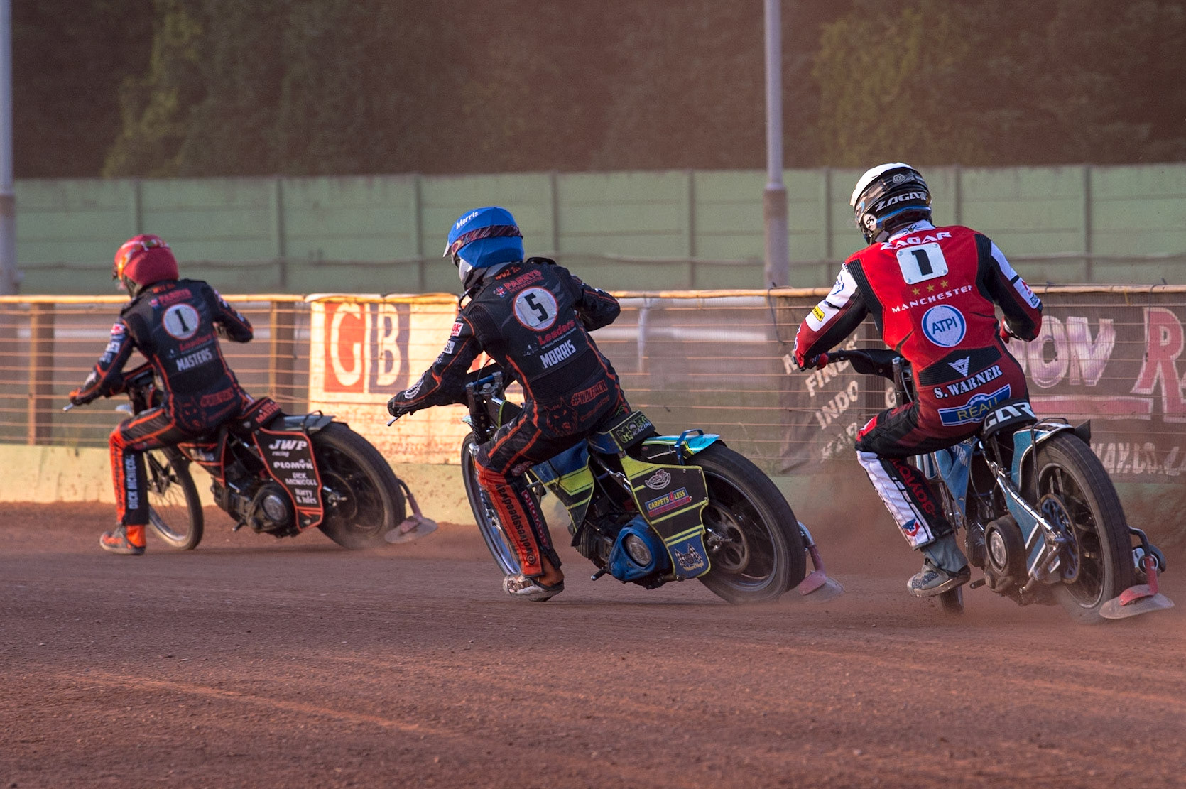 WOLVERHAMPTON, UK. JUN 20TH Matej Zagar (White) chases Nick Morris  (Blue) and Sam Masters  (Red) during the SGB Premiership match between Wolverhampton Wolves and Belle Vue Aces at Monmore Green Stadium, Wolverhampton on Monday 20th June 2022. (Credit: Ian Charles | MI News)