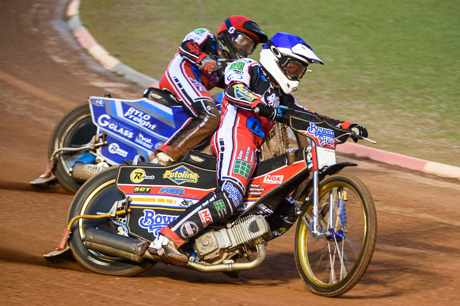 MANCHESTER, SEPT 3RD. Paul Bowen  (Blue) leads Harry McGurk  (Red) during the National Development League match between Belle Vue Aces and Mildenhall Fens Tigers at the National Speedway Stadium, Manchester on Friday 3rd September 2021. (Credit: Ian Charles | MI News)