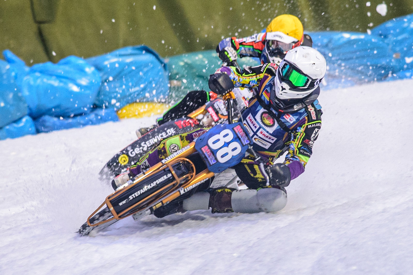 Max Neidermaier (White) leads Markus Jell (Yellow) during the German Individual Ice Speedway Championship at Horst-Dohm-Eisstadion, Berlin on Friday 3rd March 2023. (Photo: Ian Charles | MI News)
