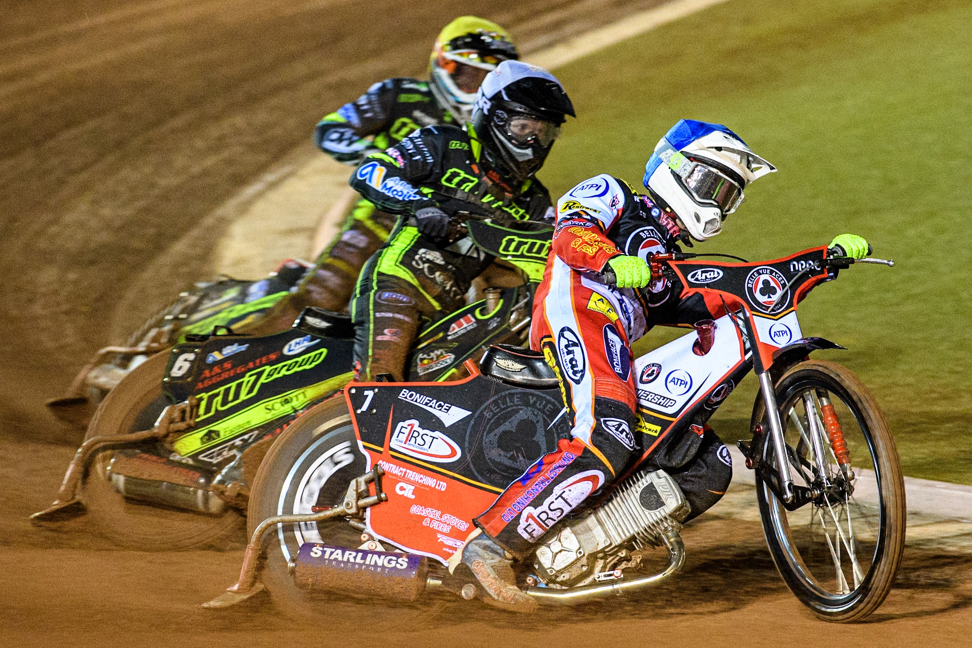 Jake Mulford of Belle Vue Aces in Blue leading Dan Thompson of Ipswich Witches in White and Jordan Jenkins of Ipswich Witches in Yellow during the Premiership Cup Quarter Final 1st Leg match between Belle Vue Aces and Ipswich Witches at the National Speedway Stadium, Manchester on Monday 24th March 2025. (Photo: Ian Charles | MI News)
