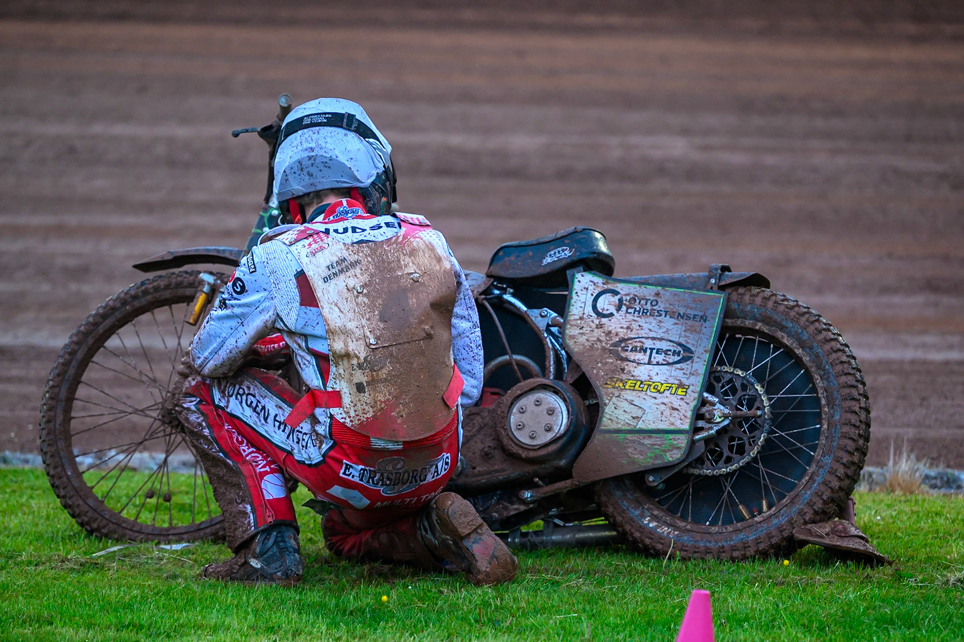 Jonas Knudsen of Denmark checks his machine after pulling up with engine trouble in Heat 16 during the Speedway GP Qualifying Round 3 at Allied Ashfield Stadium, Glasgow on Saturday 30th May 2026. (Photo: Ian Charles | MI News)