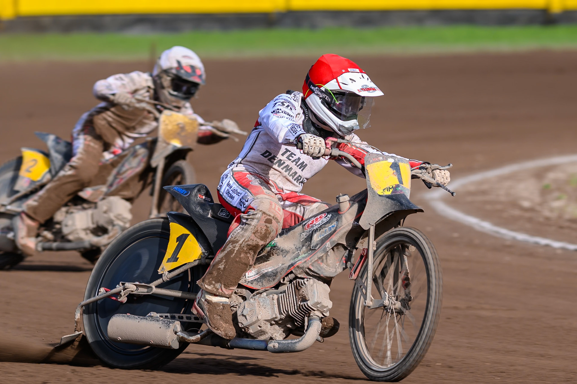 Kenneth Kruse Hansen (1) of Denmark in Red  leading Patrick Kruse (2) of Denmark in White during the FIM Long Track of Nations 2026 at the Speed Centre Roden in the Netherlands on Sunday 20th September 2026. (Photo: Ian Charles | MI News)