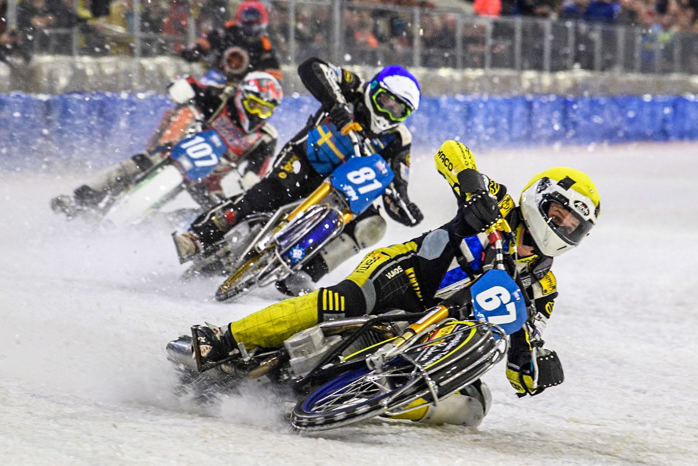 Finland's Heikki Huusko (67) in Yellow leading Sweden"s Jimmy Olsén (81) in Blue and Czech Republic's Andrej Diviš (107) in White during the FIM Ice Speedway Gladiators World Championship Final 3 at Ice Rink Thialf, Heerenveen on Saturday 6th April 2024. (Photo: Ian Charles | MI News)