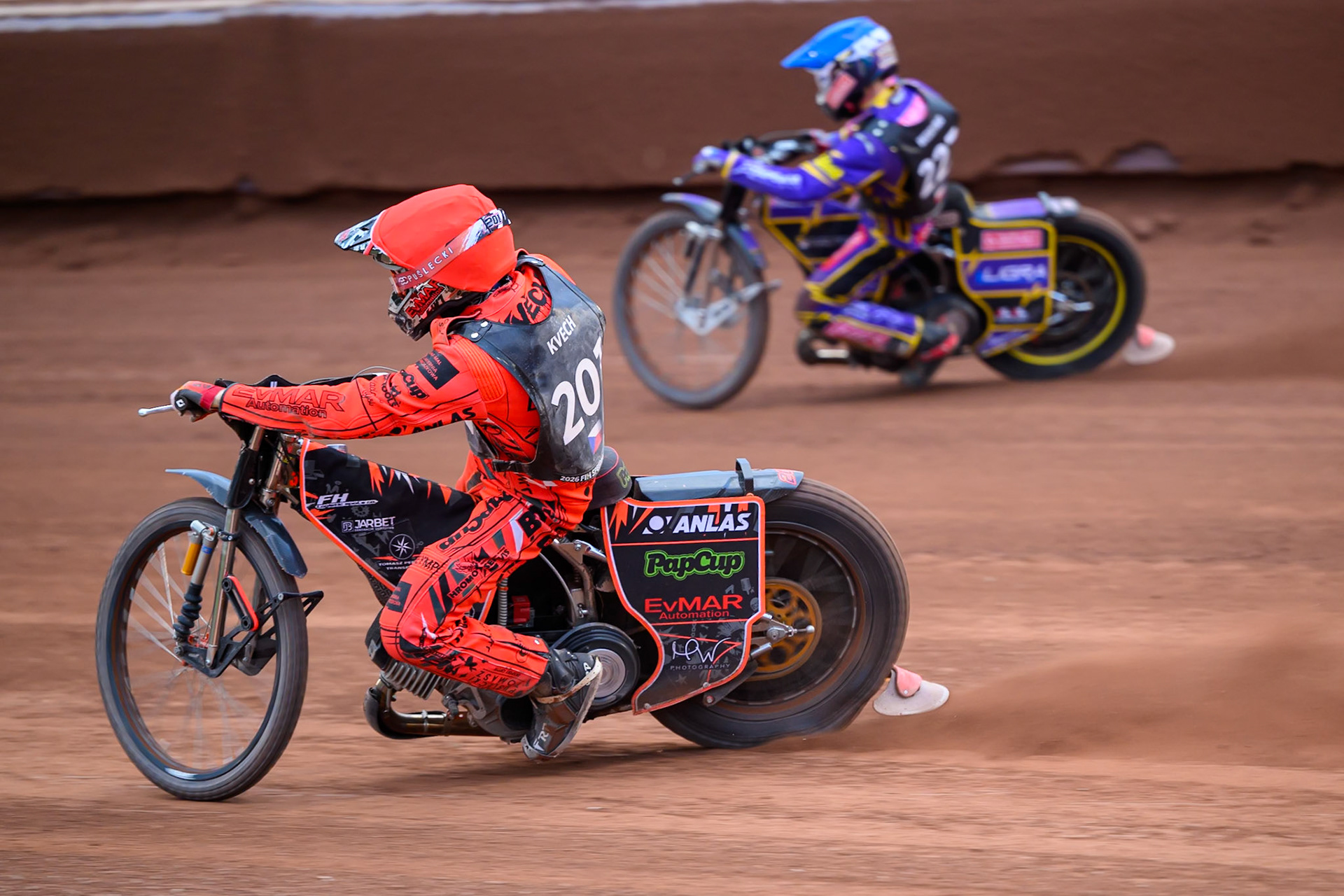 Jan Kvech (201) of Czech Republic in Red rides inside Kacper Woryna (223) of Poland in Blue during the ATPI  FIM Speedway GP of Manchester at the National Speedway Stadium, Manchester on Saturday 6th June 2026. (Photo: Ian Charles | MI News)