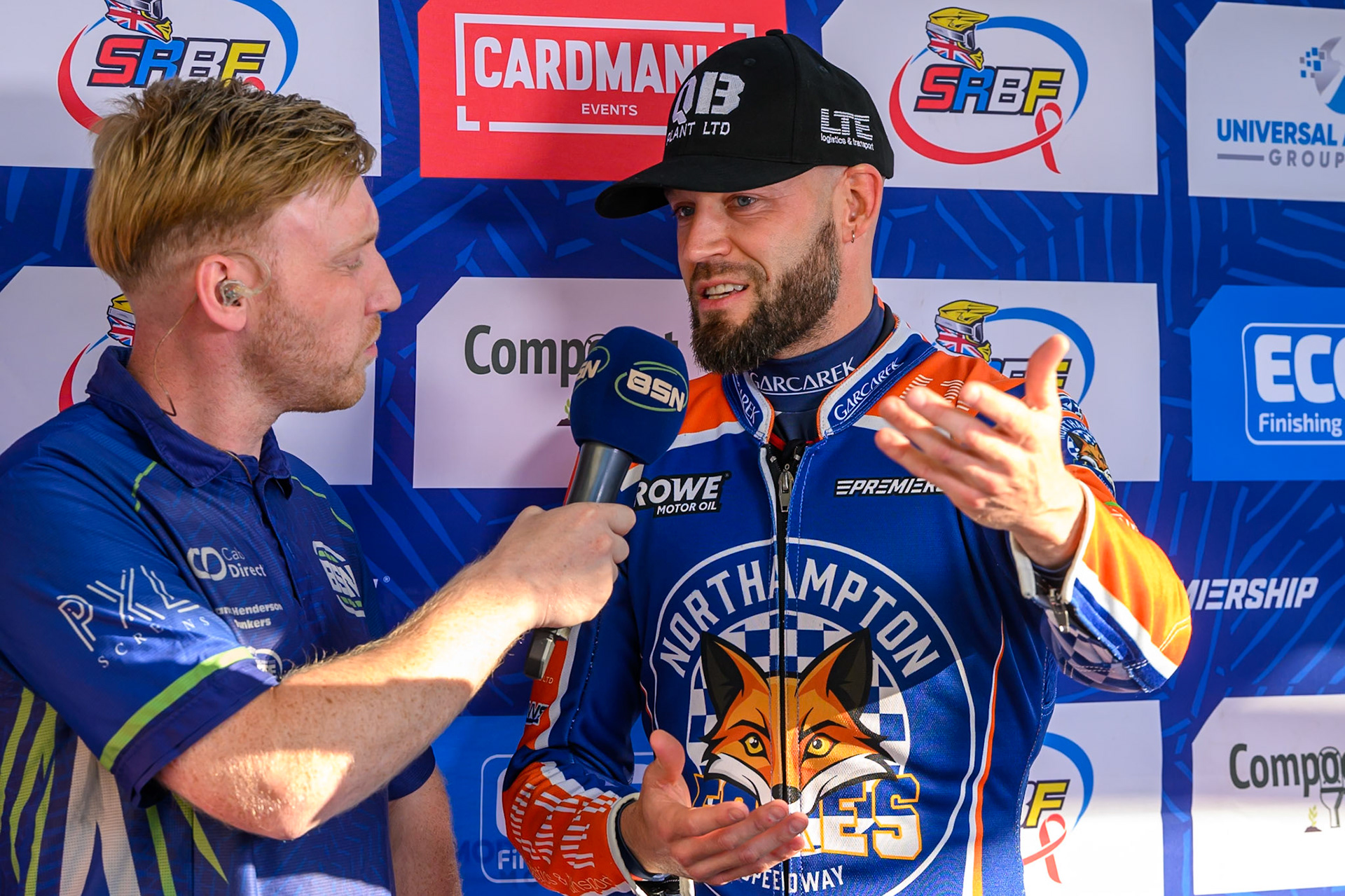 BSN Presenter Paul Bowen (Left) interviews Nicolai Klindt of Northampton Foxes during the Rowe Motor Oil Premiership match between Belle Vue Aces and Northampton Foxes at the National Speedway Stadium, Manchester on Monday 13th July 2026. (Photo: Ian Charles | MI News)