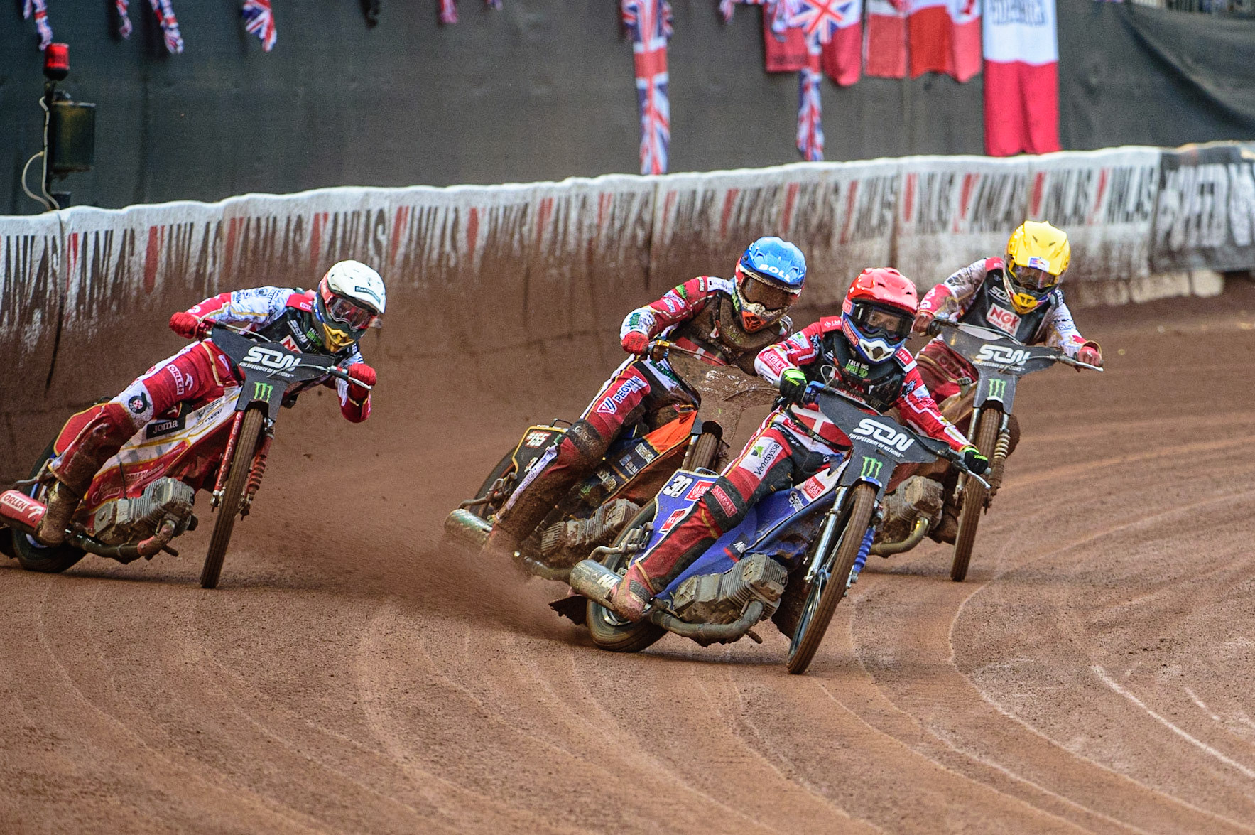 MANCHESTER, UK. OCT 17TH Leon Madsen of Denmark (Red) leads Bartosz Zmarzlik of Poland (White), Mikkel Michelsen of Denmark (Blue) and Maciej Janowski of Poland (Yellow) during the Monster Energy FIM Speedway of Nations at the National Speedway Stadium, Manchester on Sunday  17th October 2021. (Credit: Ian Charles | MI News)