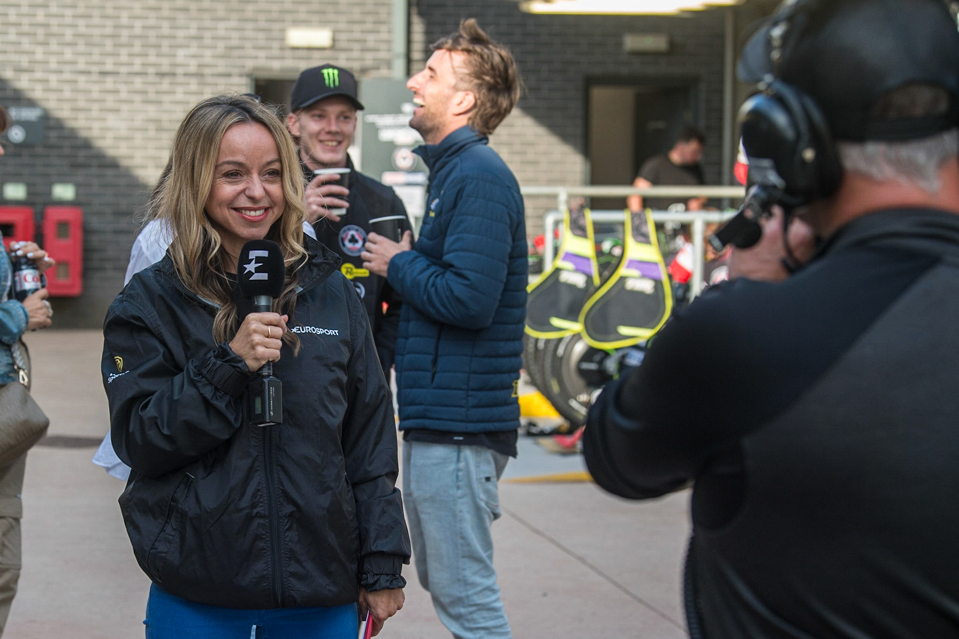 Abi Stevens does a piece to camera for Eurosport during the Sports Insure Premiership match between Belle Vue Aces and Sheffield Tigers at the National Speedway Stadium, Manchester on Monday 7th August 2023. (Photo: Ian Charles | MI News)