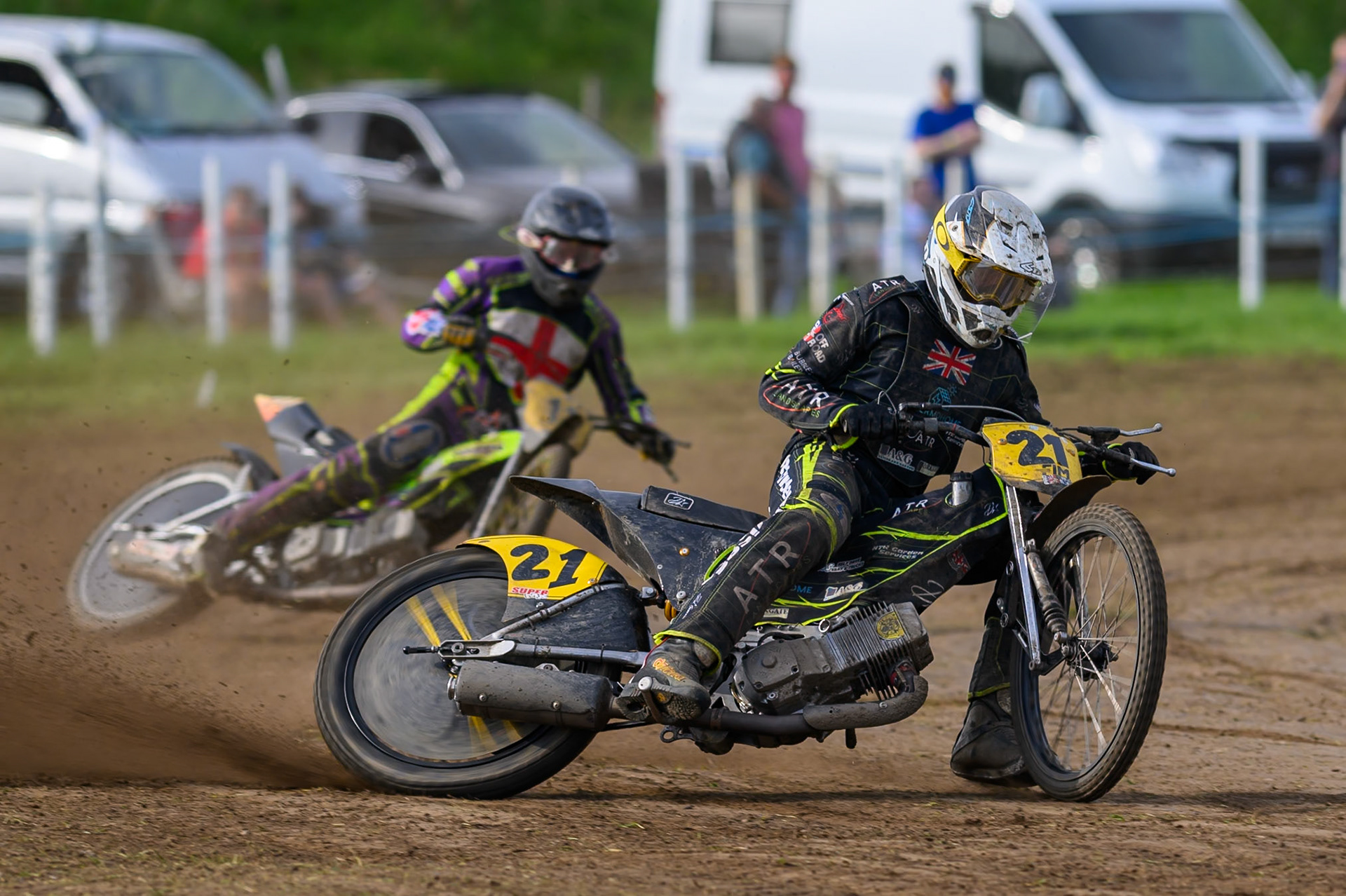 British Masters (Solos): Darryl Ritchings (21)  leading  Paul Cooper (11) during the British Masters Grasstrack Championship at Lower Marsh Farm, Much Hoole, Preston in Lancashire, England on Sunday 13th September 2026. (Photo: Ian Charles | MI News)