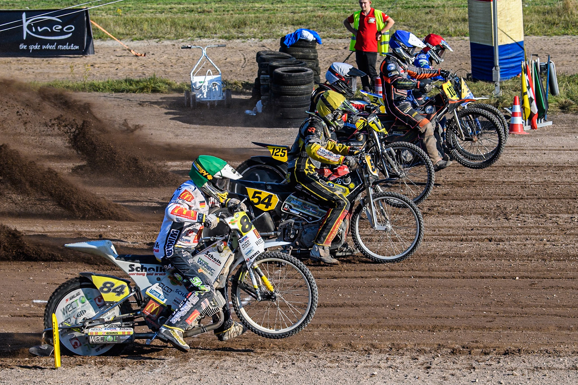 Long Track Final: (L to R) Martin Smolinski (84) of Germany in Green, Mika Meijer (54) of The Netherlands in Yellow, \Lukas Fienhage (125) of Germany in White, Zach Wajtknecht (109) of Great Britain in Blue and Chris Harris (37)of Great Britain in Red   during the FIM Long Track World Championship Final 5 at the Speed Centre Roden, Roden, Netherlands on Sunday 22nd September 2024. (Photo: Ian Charles | MI News)