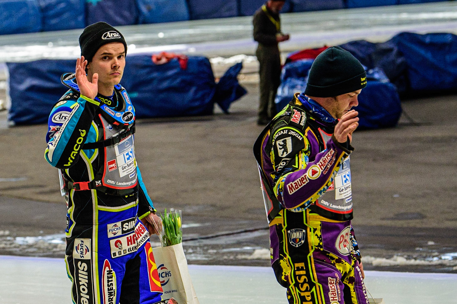 Luca Bauer (48) (left) and Max Neidermaier (18) (Reserve) on the pre-meeting parade during the Ice Speedway Gladiators World Championship Final 1 at Max-Aicher-Arena, Inzell, Germany on Saturday 18th March 2023. (Photo: Ian Charles | MI News)