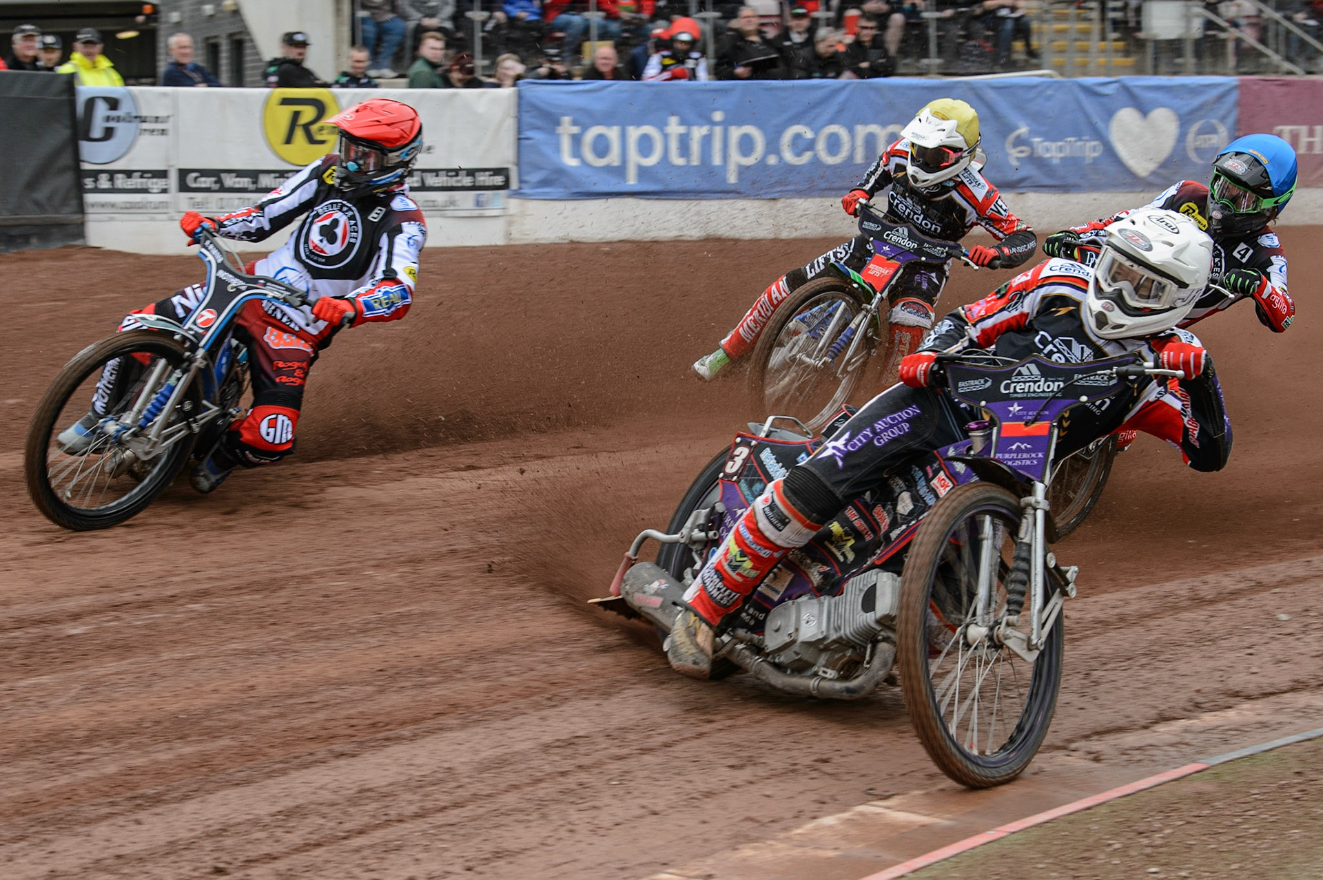 MANCHESTER, UK. MAY 2ND  Ulrich Ostergaard  (White) inside Matej Žagar  (Red) with Hans Andersen   (Yellow) and Charles Wright  (Blue) behind during the SGB Premiership match between Belle Vue Aces and Peterborough at the National Speedway Stadium, Manchester on Monday 2nd May 2022. (Credit: Ian Charles | MI News)