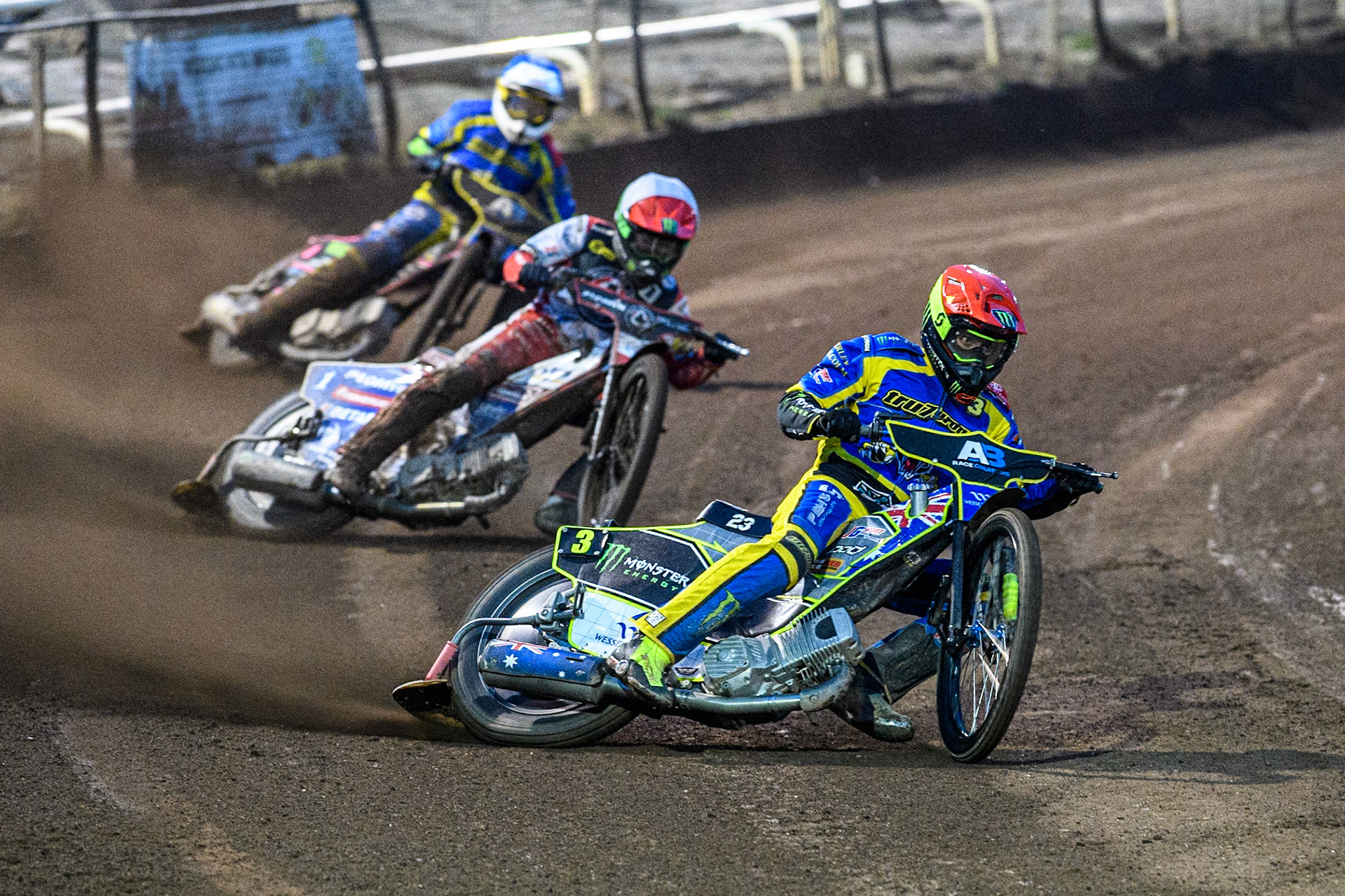 Sheffield Tigers' Chris Holder  in Red leading Belle Vue Aces' Dan Bewley   in White and Sheffield Tigers' Kyle Howarth  in Blue during the Rowe Motor Oil Premiership match between Sheffield Tigers and Belle Vue Aces at Owlerton Stadium, Sheffield on Monday 26th August 2024. (Photo: Ian Charles | MI News)