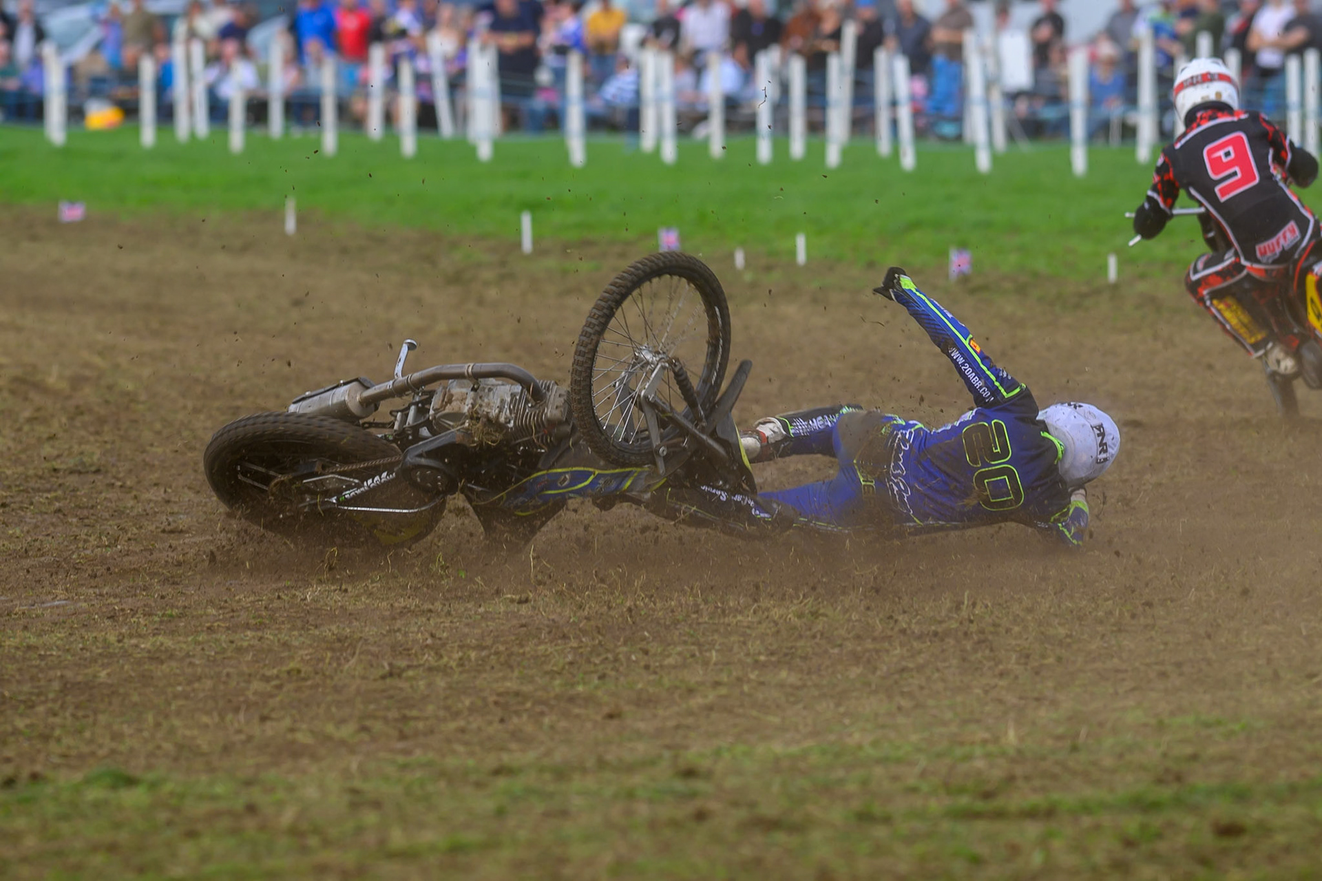 British Masters (Solos): Arran Butcher (20)  falls on the loose track during the British Masters Grasstrack Championship at Lower Marsh Farm, Much Hoole, Preston in Lancashire, England on Sunday 13th September 2026. (Photo: Ian Charles | MI News)