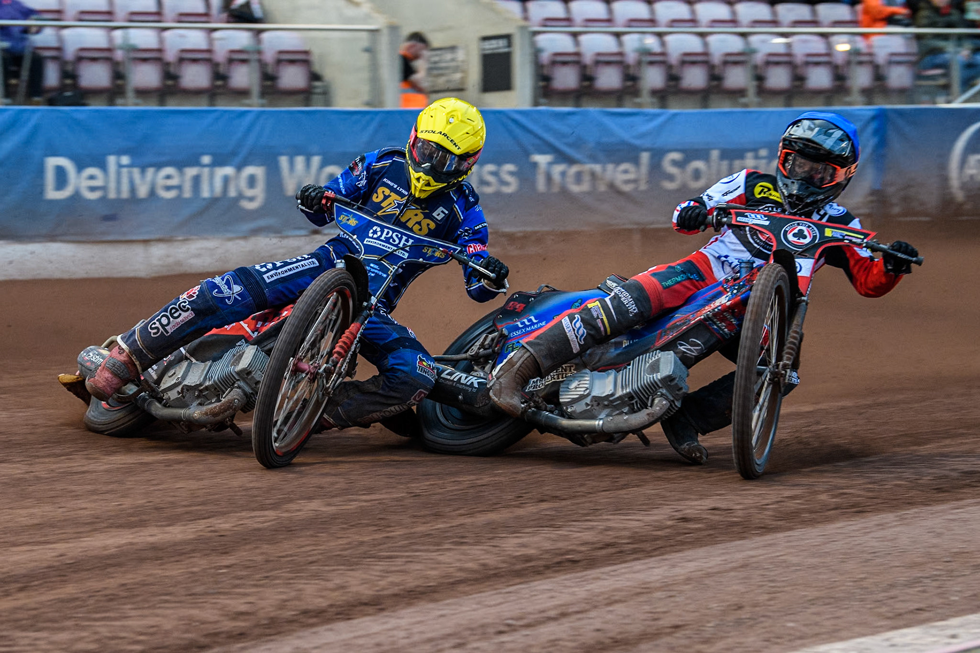 King Lynn Stars' Patryk Wojdylo in Yellow leading Belle Vue Aces' Ben Cook in Blue during the Rowe Motor Oil Premiership match between Belle Vue Aces and King's Lynn Stars at the National Speedway Stadium, Manchester on Monday 20th May 2024. (Photo: Ian Charles | MI News)
