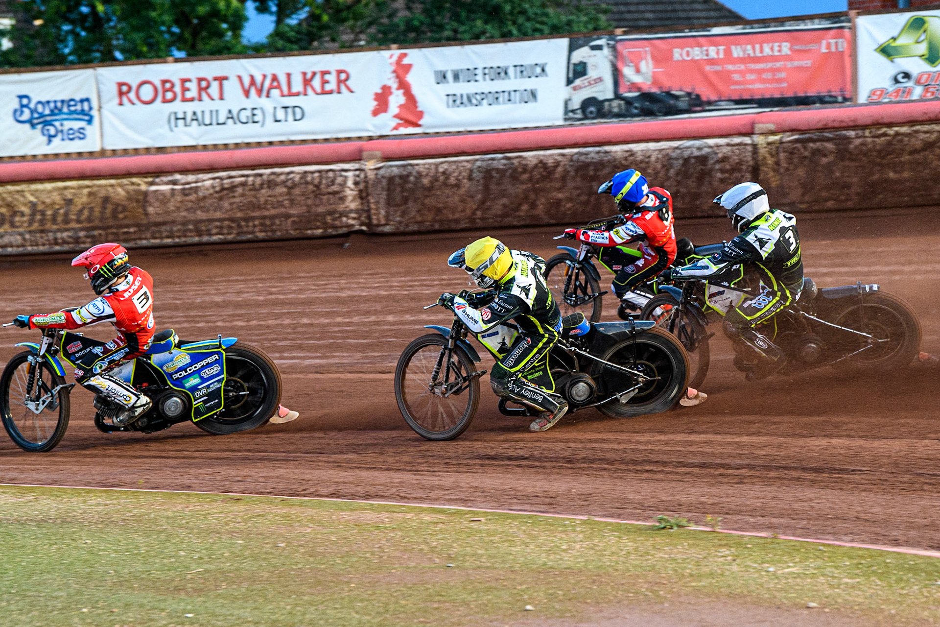 Jaimon Lidsey (Red) and Tom Brennan (Blue) lead Danny King (White) and Danyon Hume (Yellow) during the Sports Insure Premiership match between Belle Vue Aces and Ipswich Witches at the National Speedway Stadium, Manchester on Monday 17th July 2023. (Photo: Ian Charles | MI News)